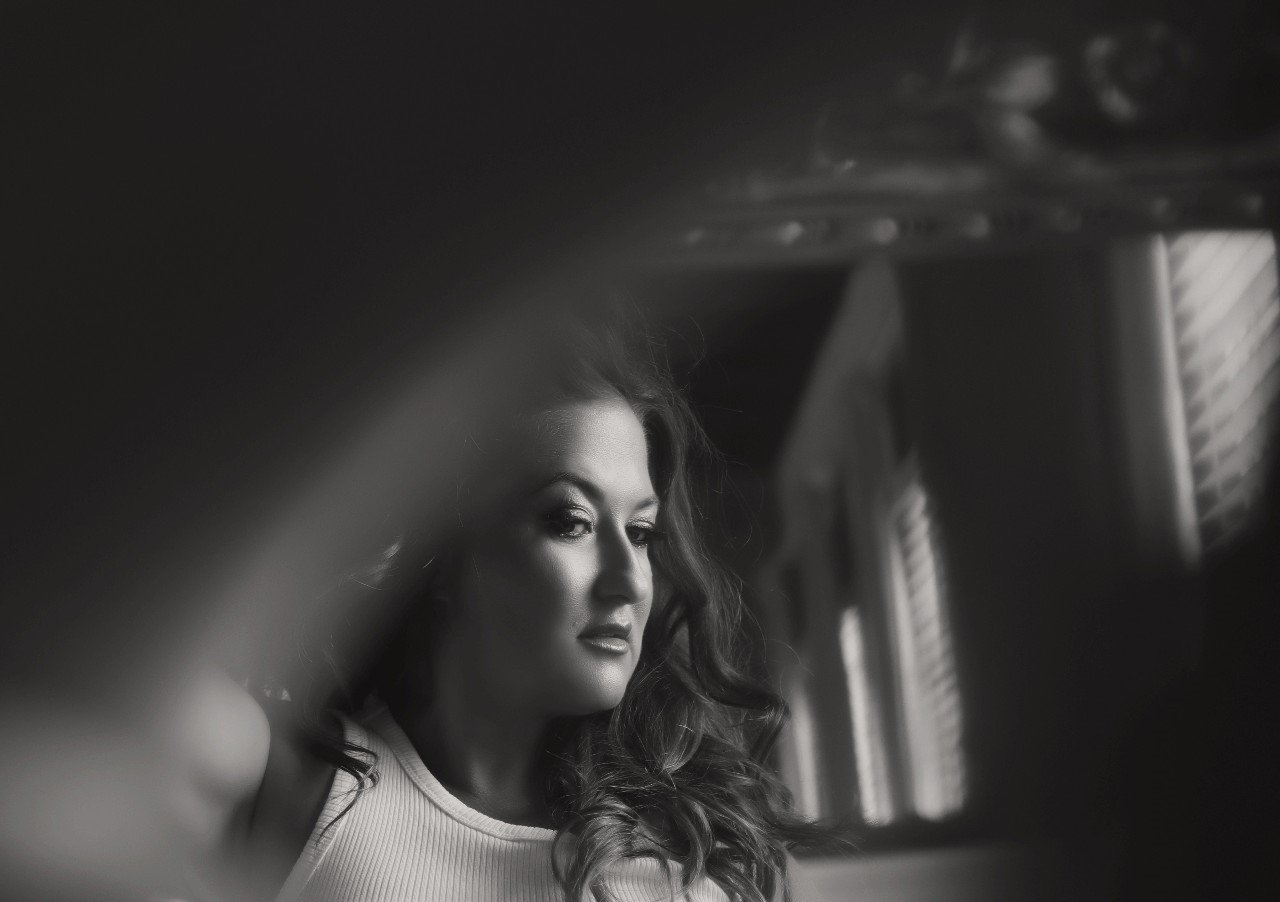 Black and white portrait of Carrie, founder of Carrie & Co.