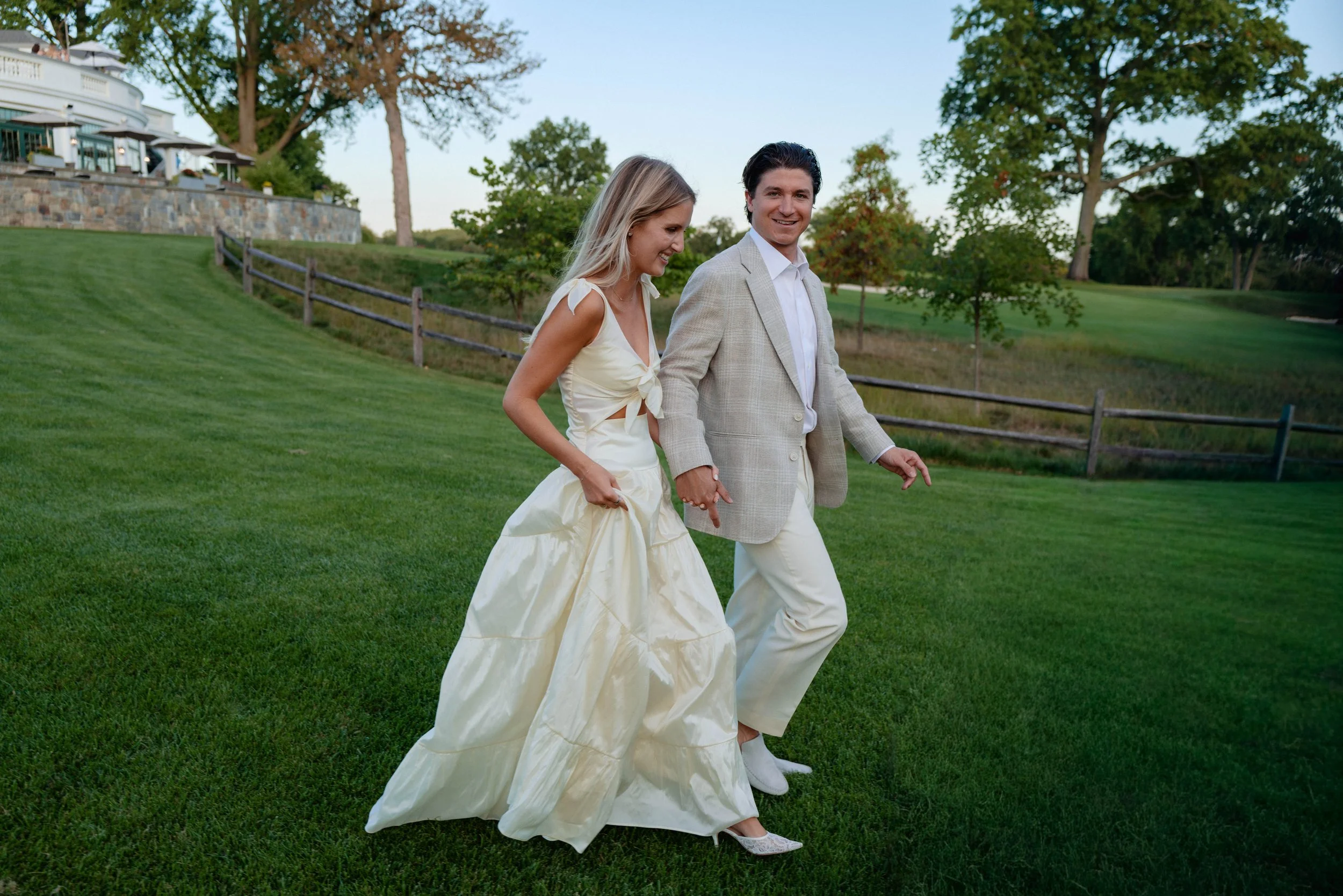 People who just got married on green grass