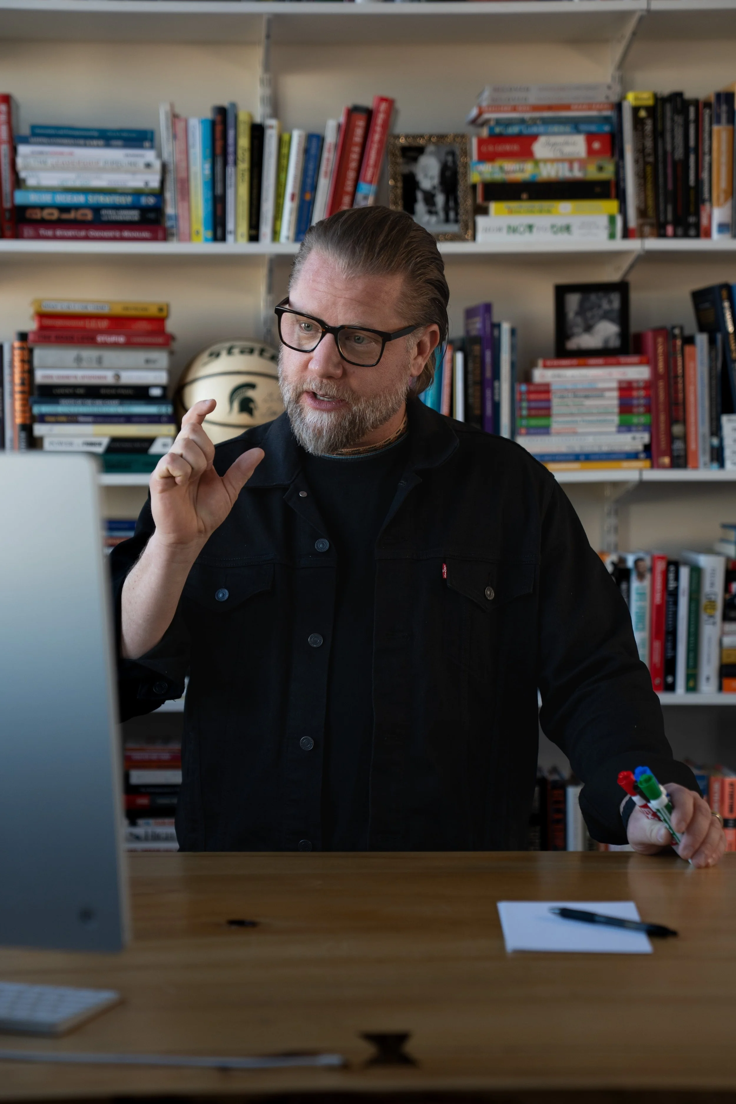 Ryan Henry working with an entrepreneur in a virtual class