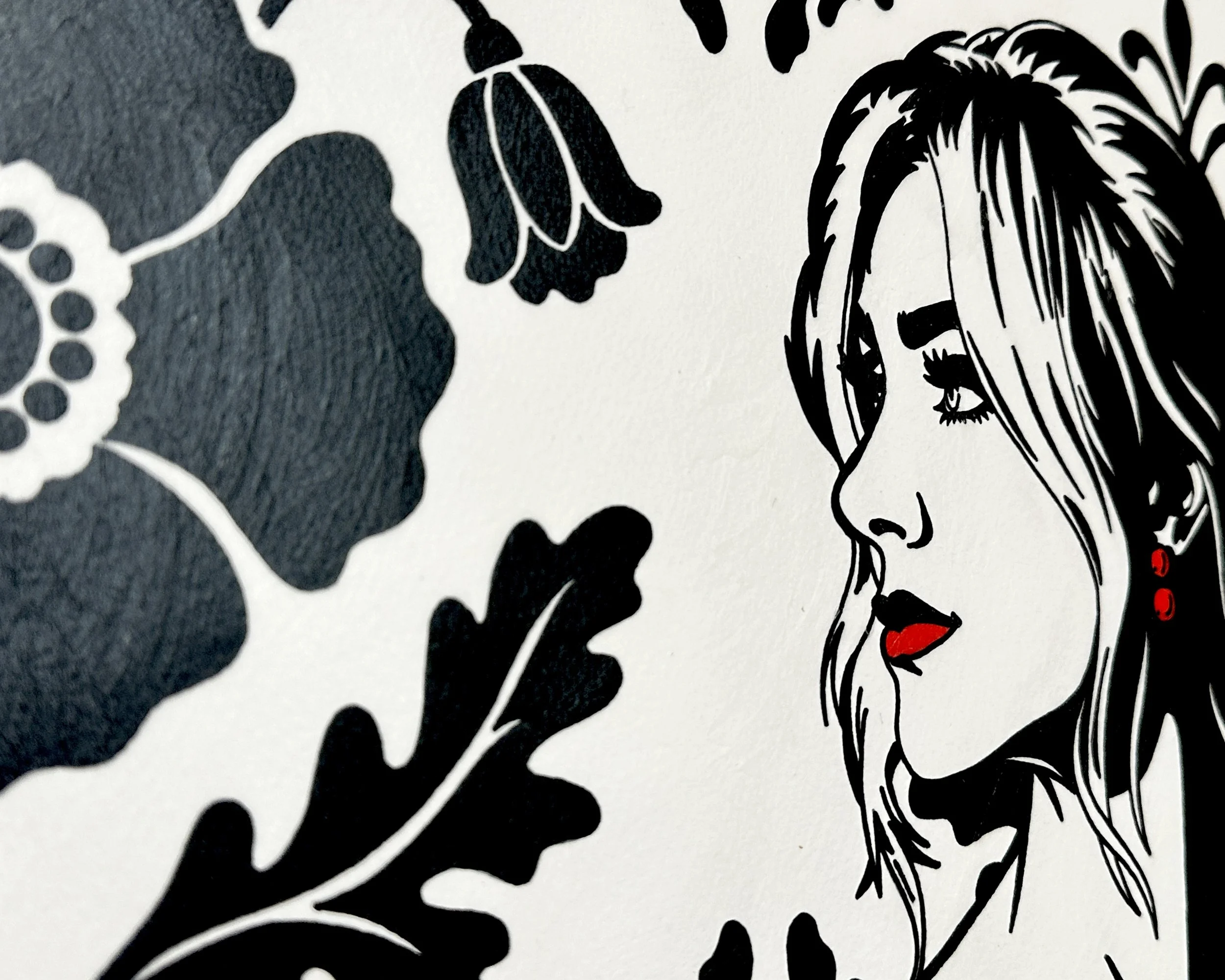 Artist Brett Hodges at Quiet Corner Art Studio, Omaha, NE, close detail of A Promise to Herself showing the bride’s face, red lips, red earrings, and surrounding floral background pattern.