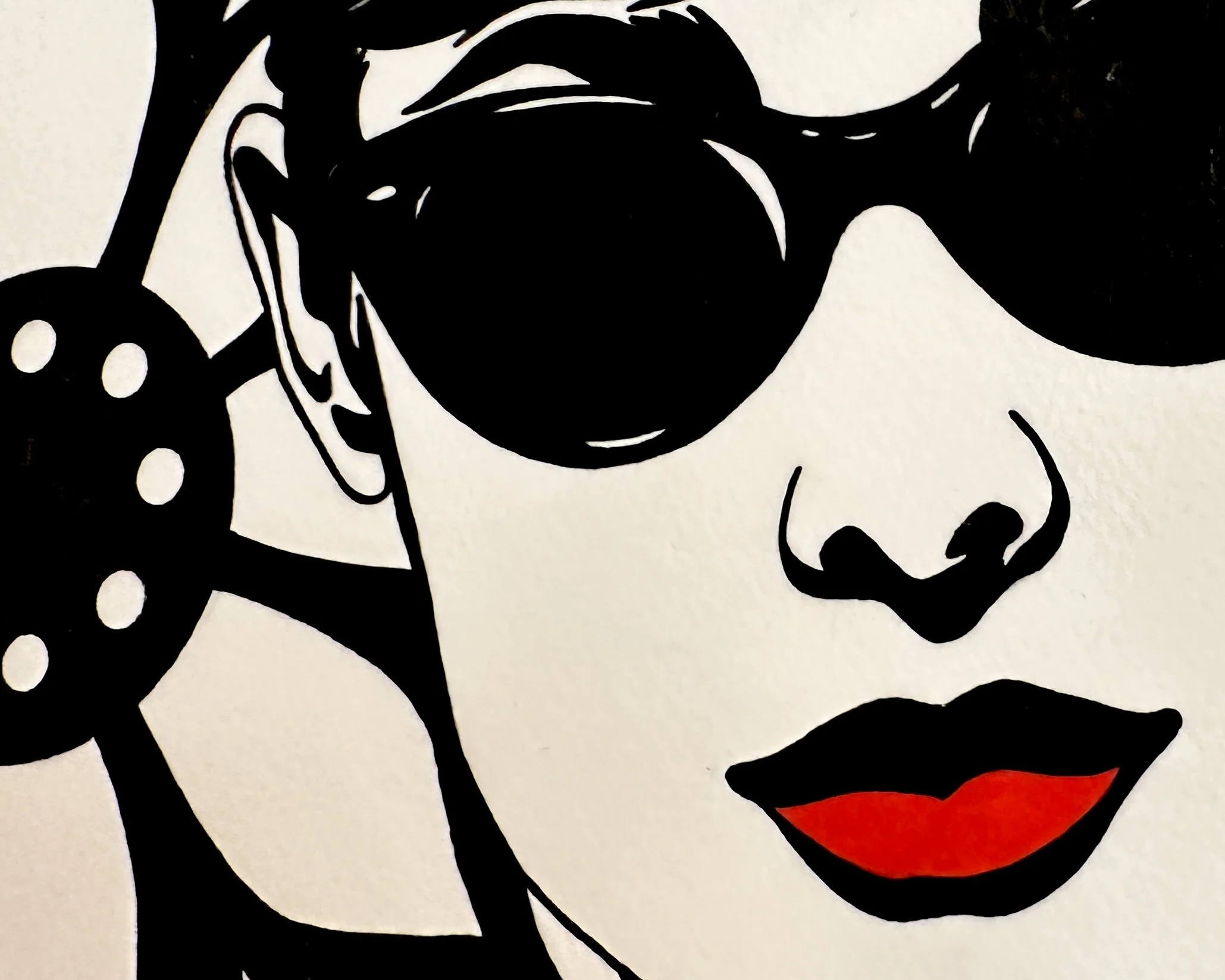 Artist Brett Hodges at Quiet Corner Art Studio, Omaha, NE, original gouache Pop Art portrait inspired by Audrey Hepburn and Breakfast at Tiffany’s with bold black and white linework and red accents.
