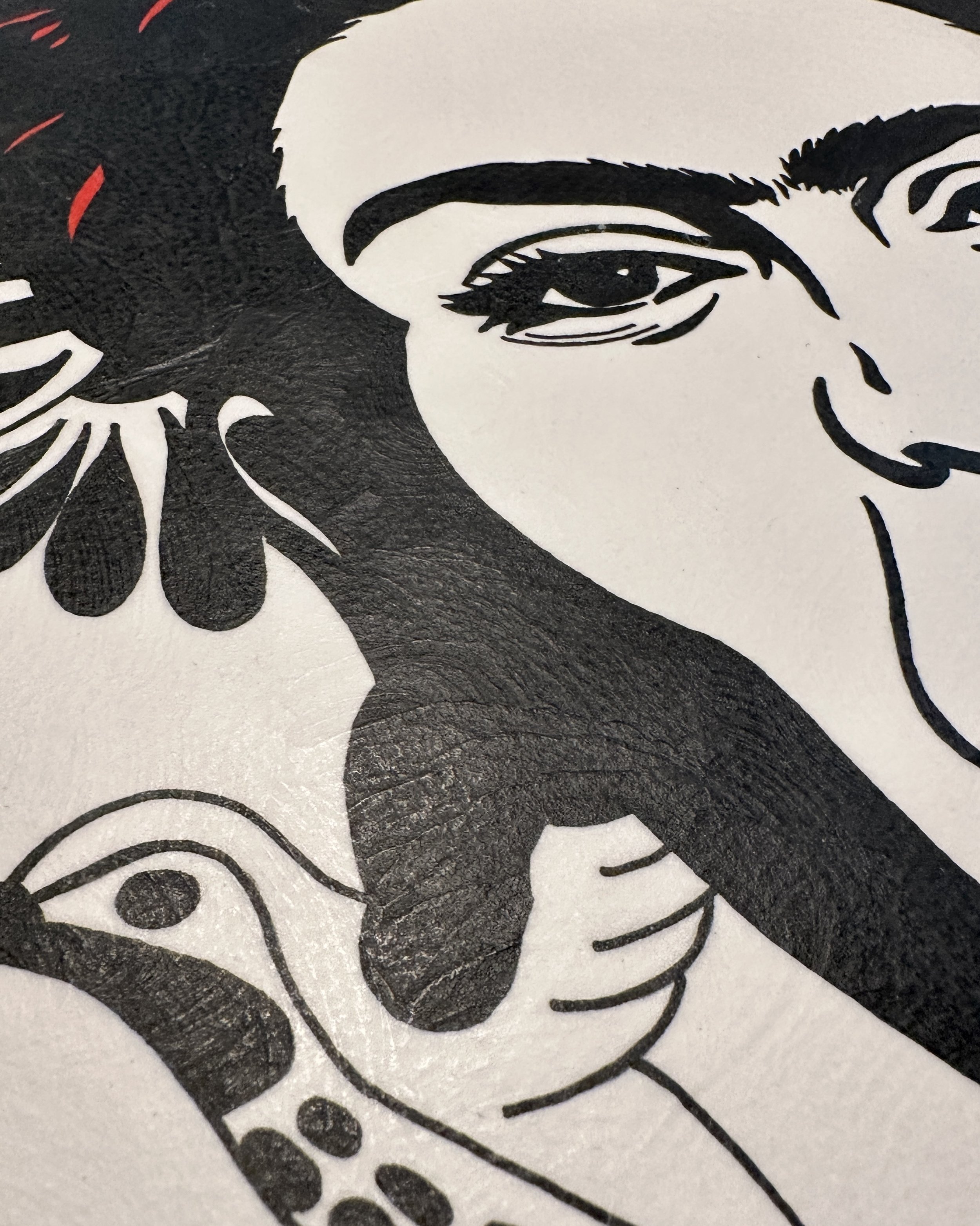 Detail of Frida Kahlo's iconic gaze and eyebrows painted in a modern high contrast style.