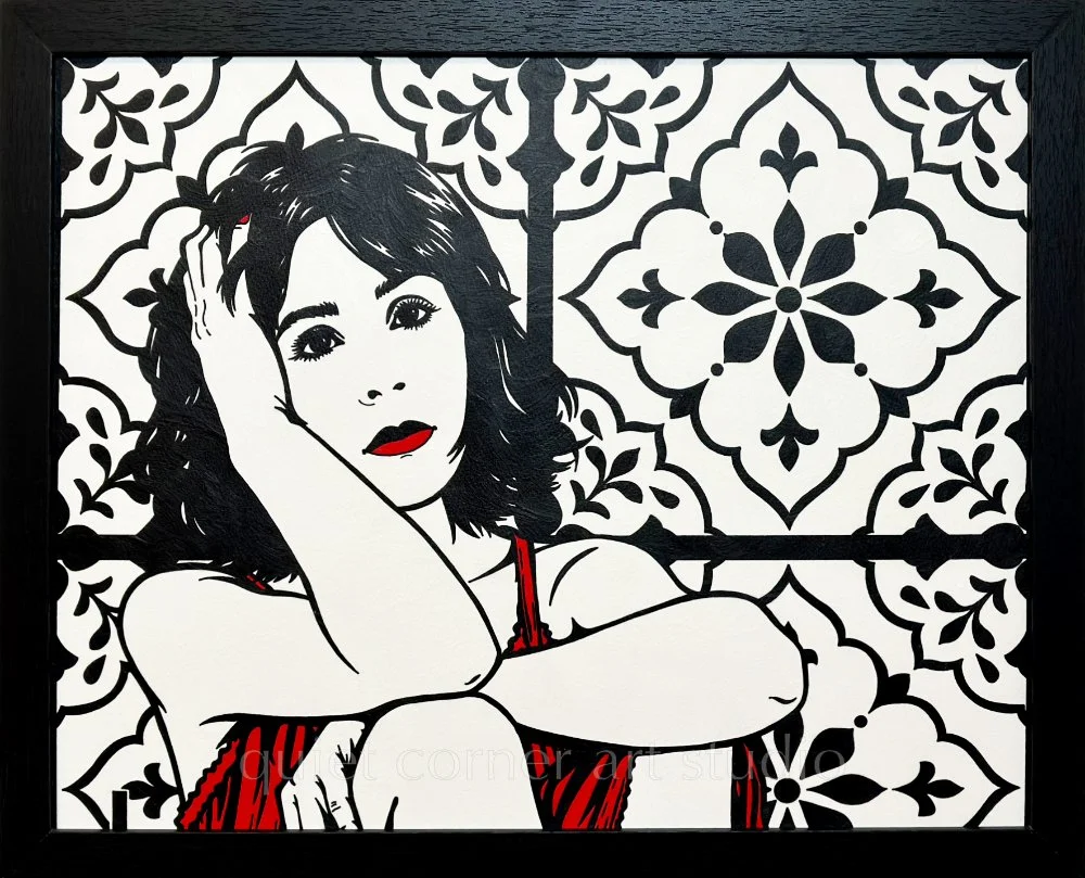 Artist Brett Hodges at Quiet Corner Art Studio, Omaha, NE, original gouache Pop Art bridal portrait titled Before the Beginning, featuring a seated bride in a red dress with black and white line work and an ornate floral background.
