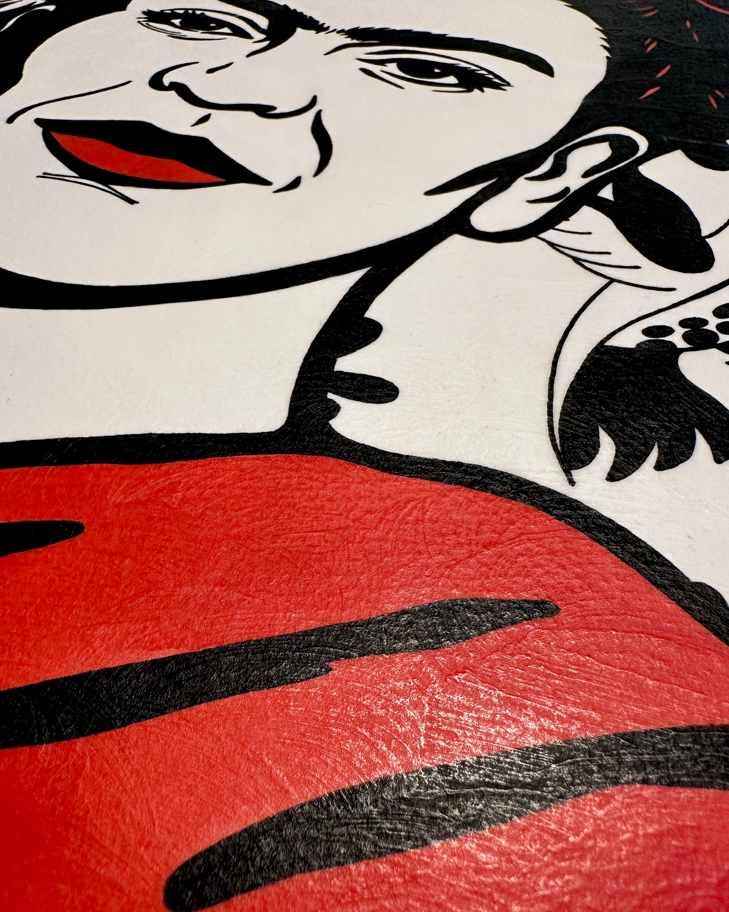 Close up detail of gouache paint texture on cotton paper showing the matte wax finish without glass.