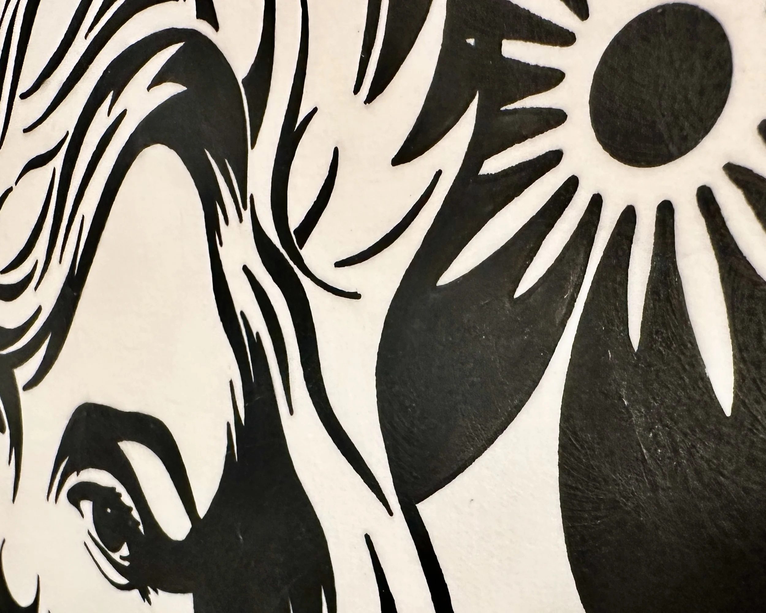 Close up detail of bold black and white gouache silhouette brushwork on archival cotton paper.
