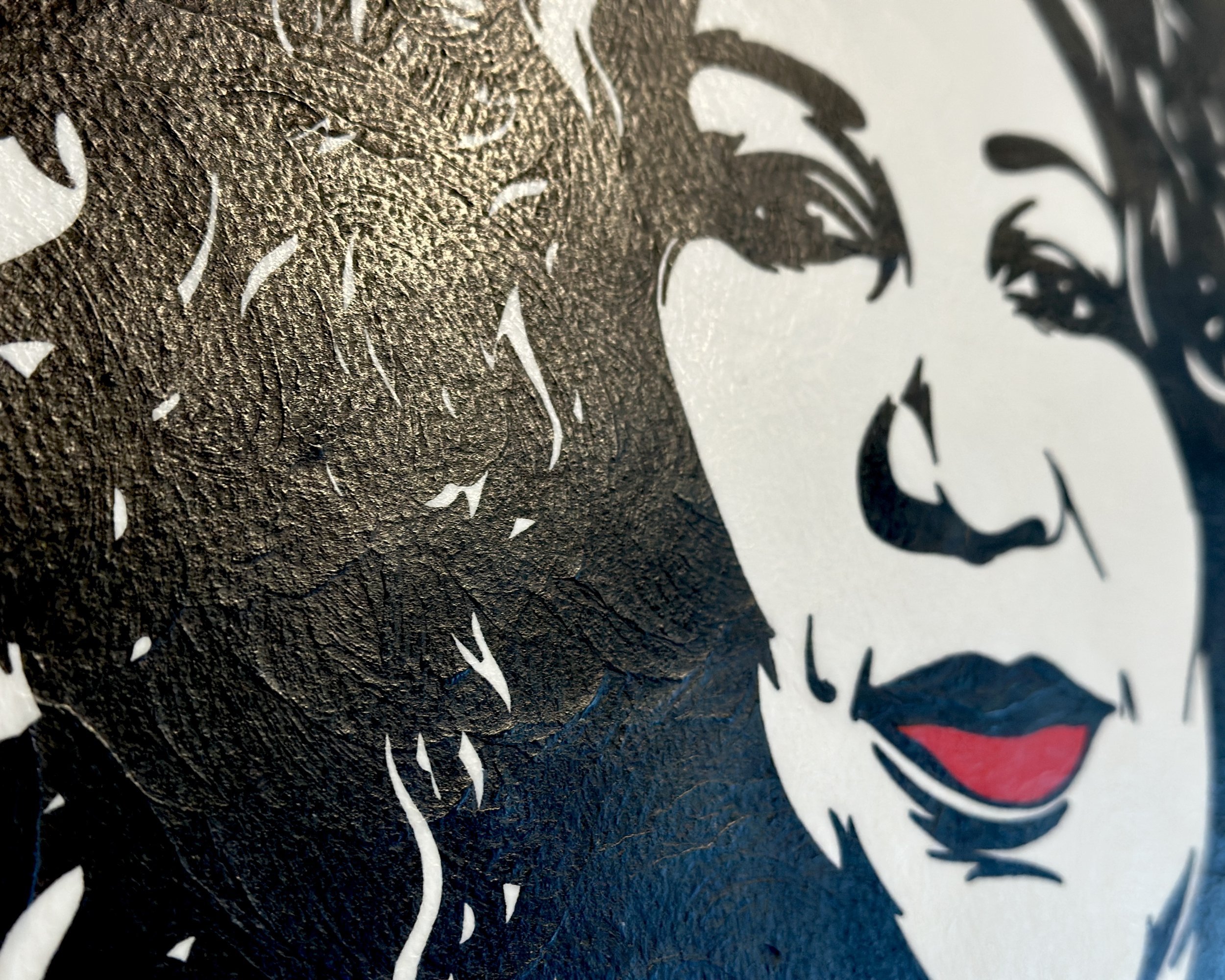 Artist Brett Hodges at Quiet Corner Art Studio, Omaha, NE, original gouache Pop Art portrait of Aretha Franklin with bold black and white linework and red accents.