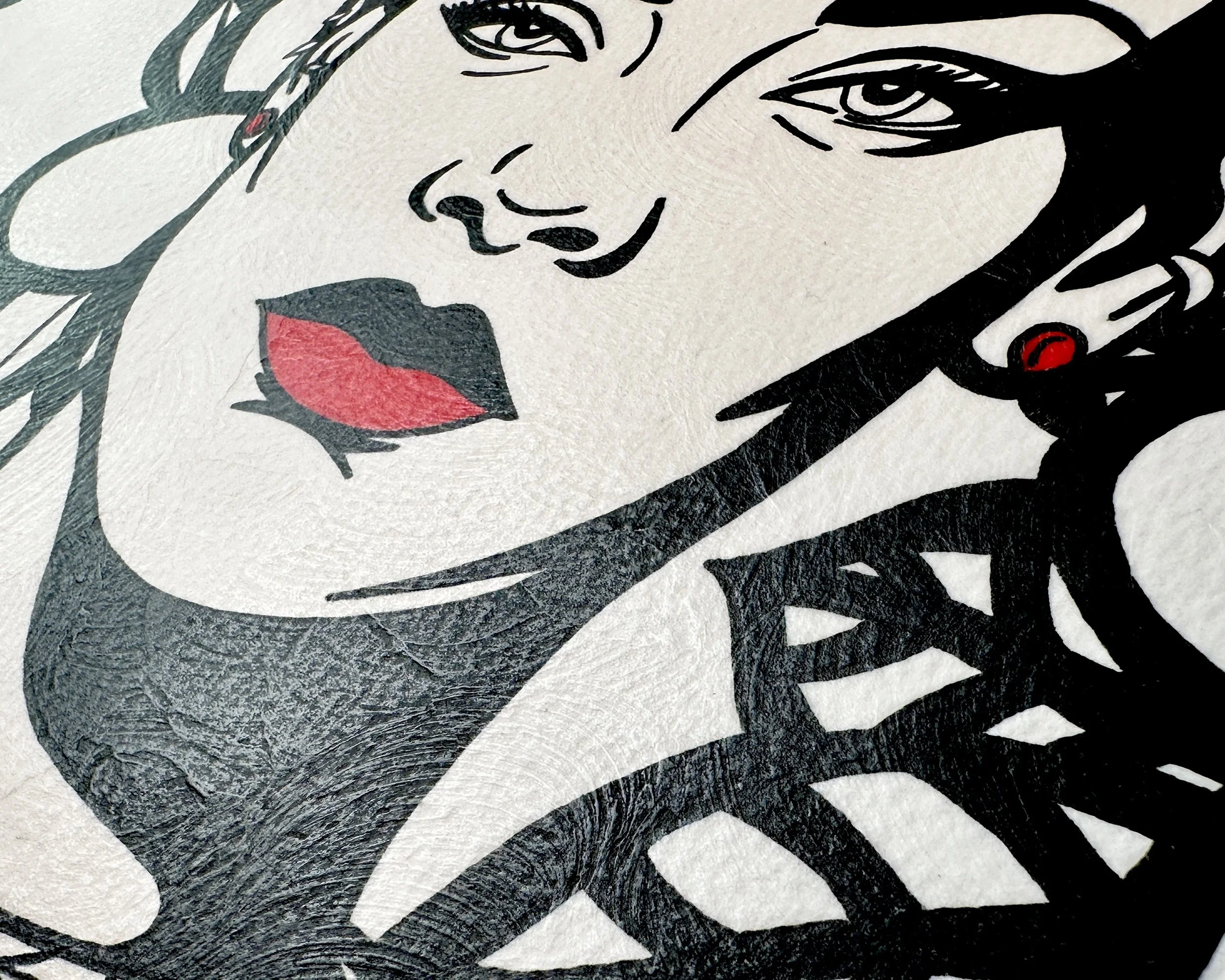 Artist Brett Hodges at Quiet Corner Art Studio, Omaha, NE, Pop Art portrait of Rihanna with bold black and white contrast and contemporary red accents.