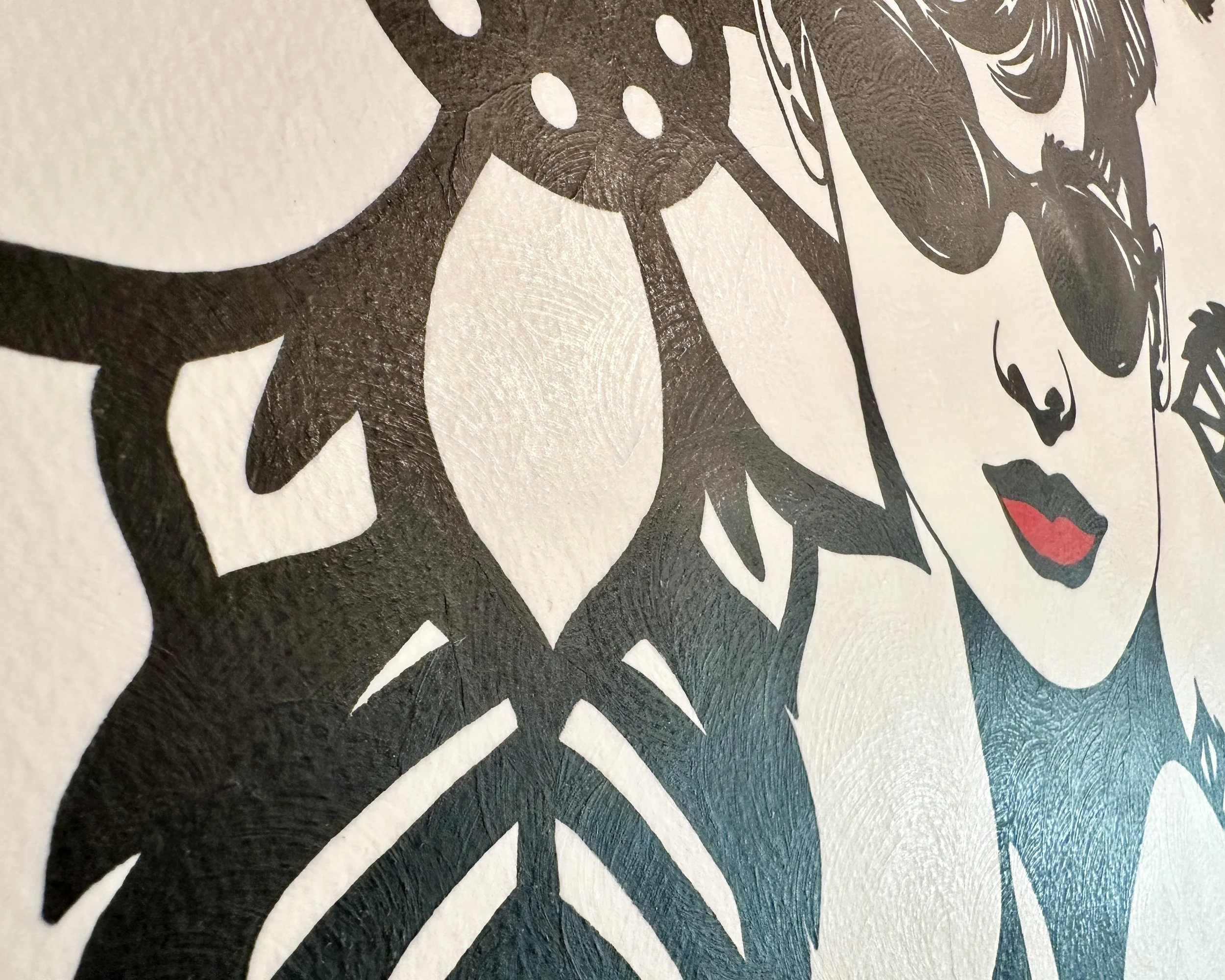 Original framed painting titled In Audrey's Footsteps featuring a pop art portrait of Audrey Hepburn with sunglasses and a floral background by Omaha artist.