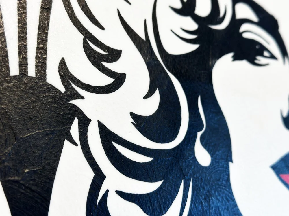 Angled macro photography showing the matte texture of gouache sealed with Dorland’s wax.