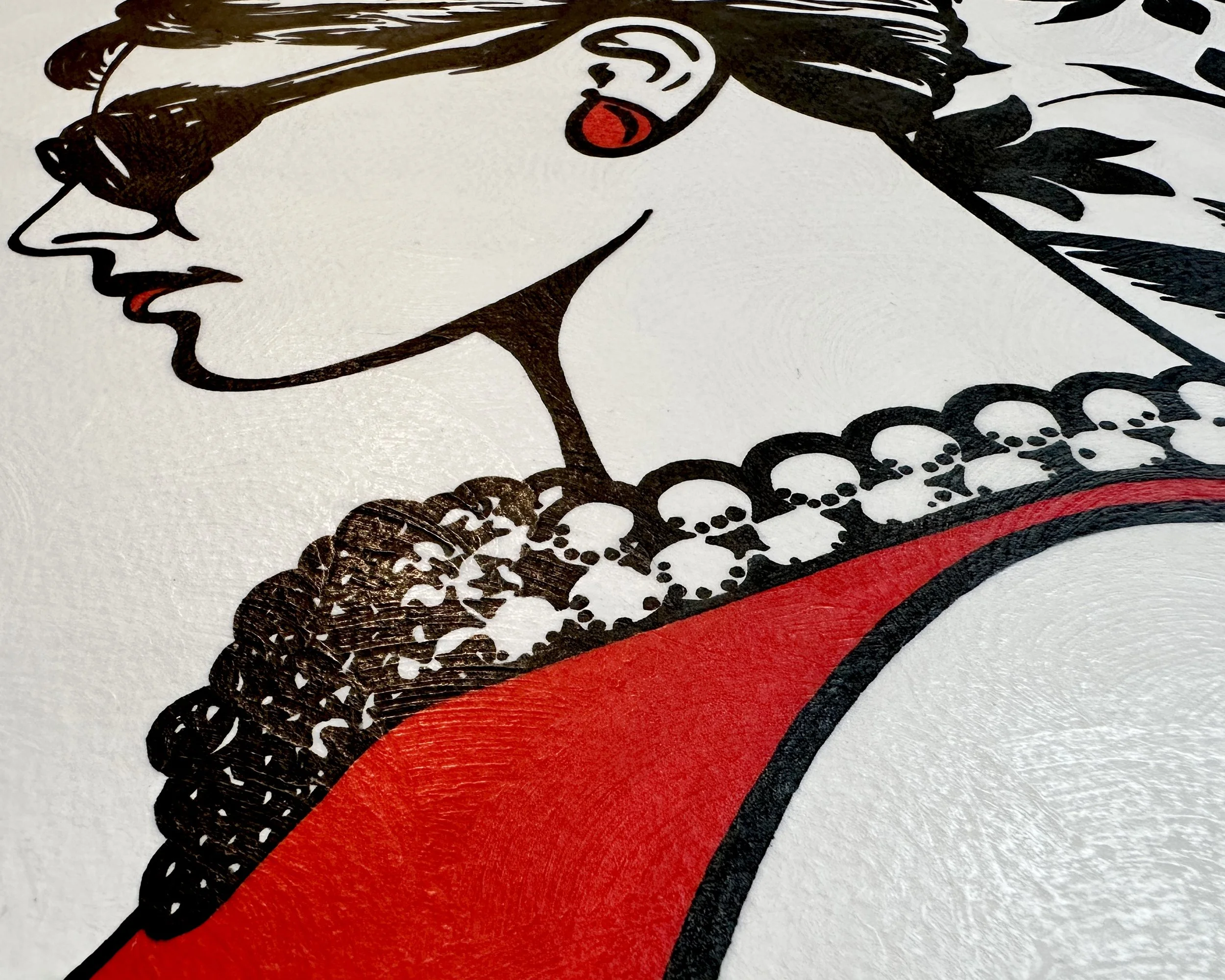 Artist Brett Hodges at Quiet Corner Art Studio, Omaha, NE, original gouache Pop Art portrait inspired by Breakfast at Tiffany’s and Audrey Hepburn, featuring bold black and white linework with a red Pop Art background.