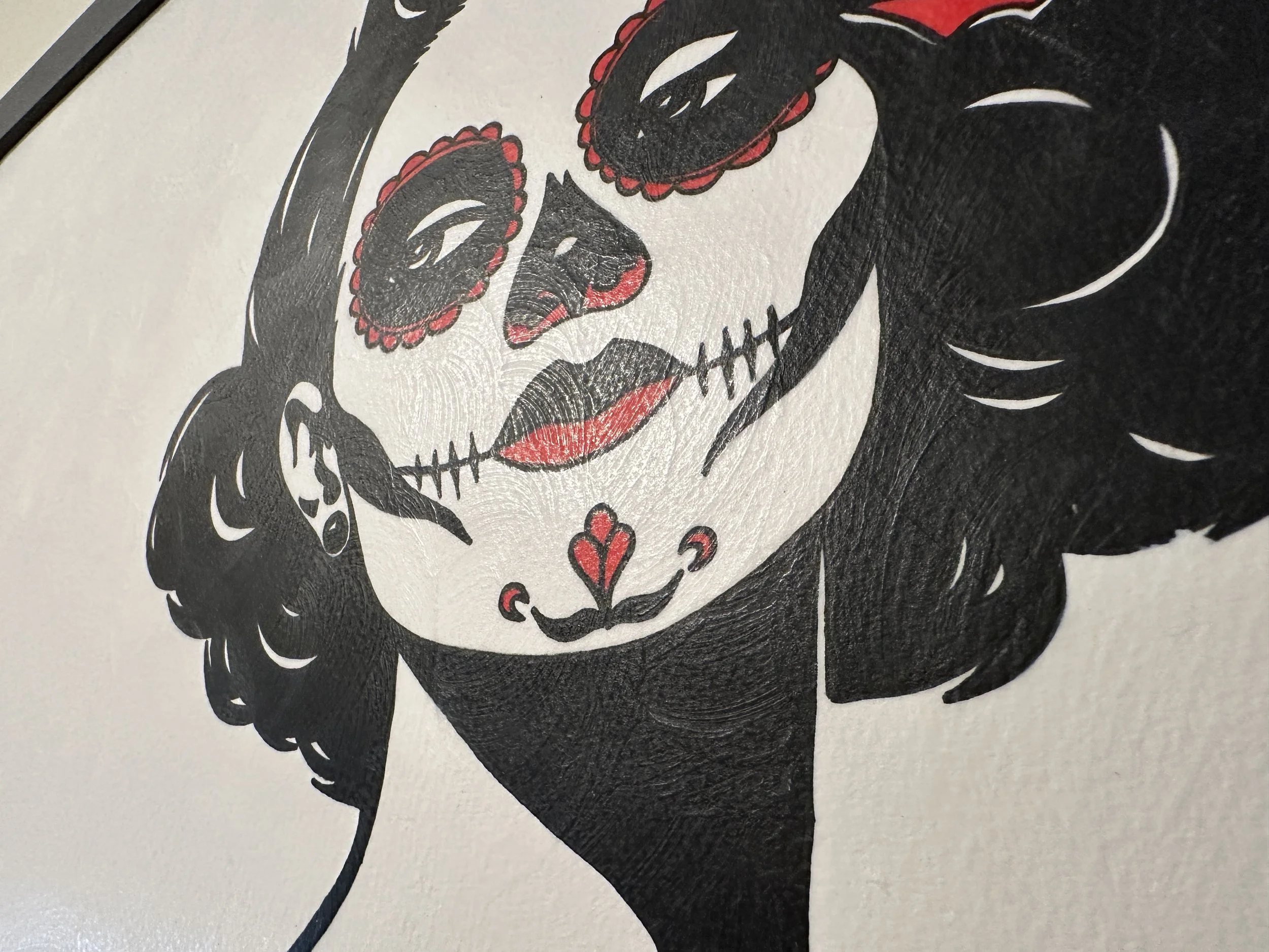 Macro photography showing the matte texture of gouache on cotton paper sealed with wax for a glass free finish.