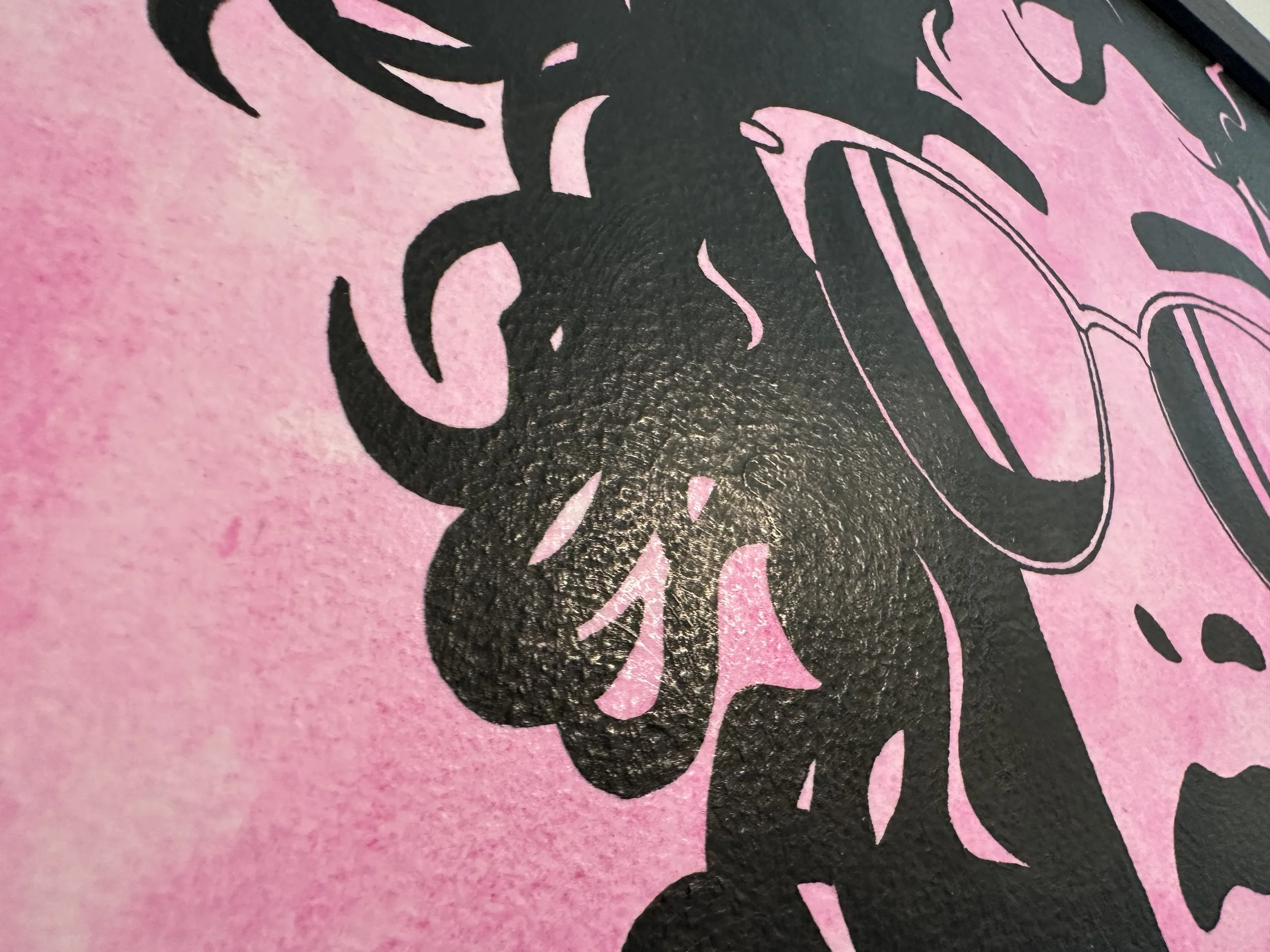 Close up detail of curly hair silhouette and hoop earrings in a high contrast pop art style.