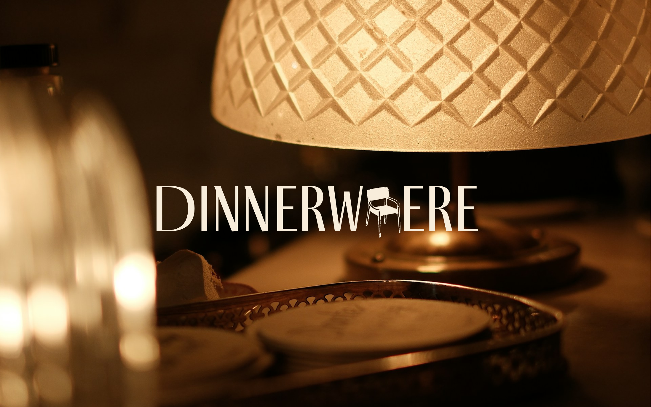 Warm glow of a lamp with the Dinnerwhere logo overlayed.