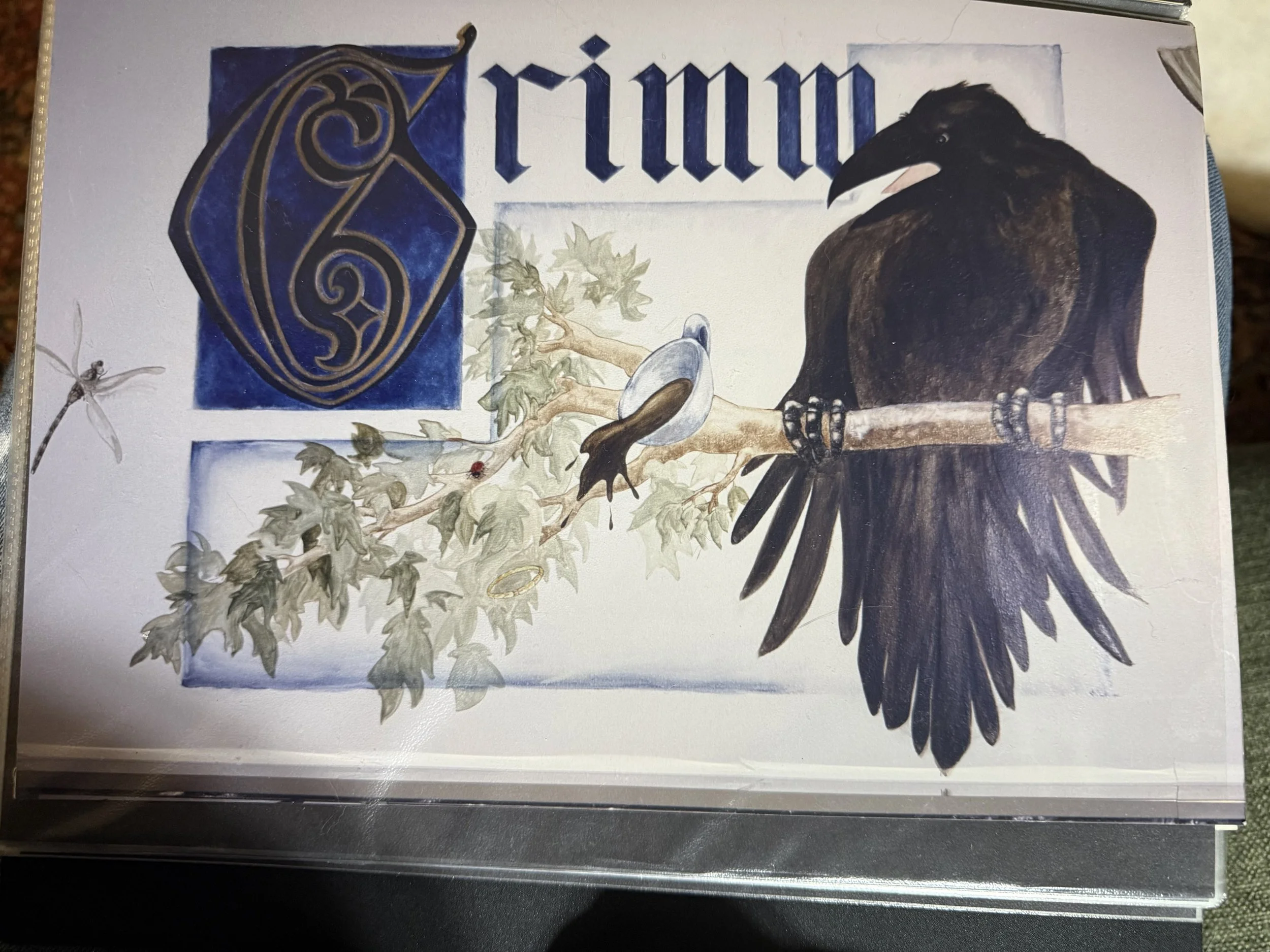 A painted greeting card featuring a black bird perched on a branch, with a passionflower and a gold ring, along with the text 'Thank You' in gothic style.