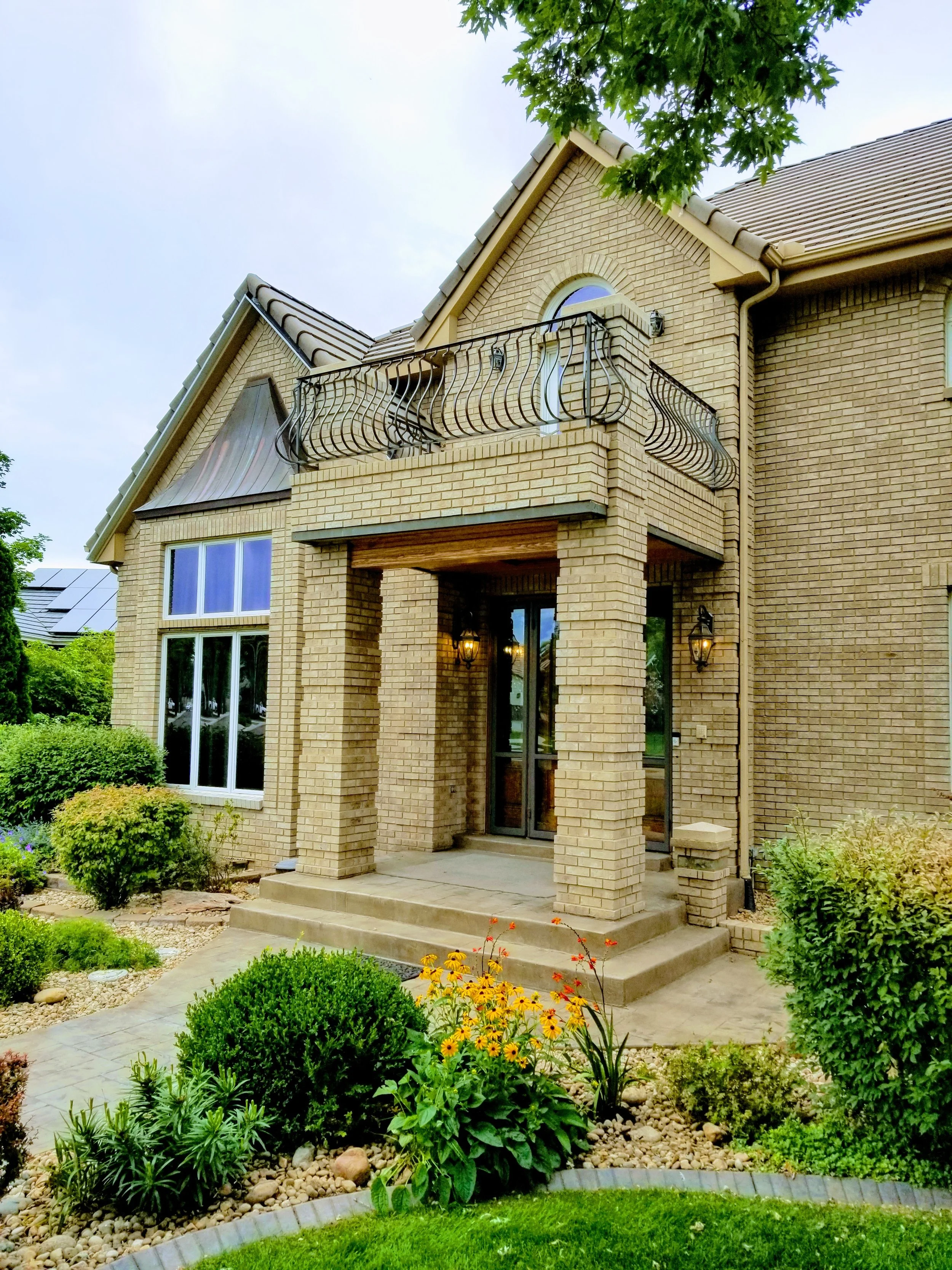 Exterior metal balcony railing installed on a residential property