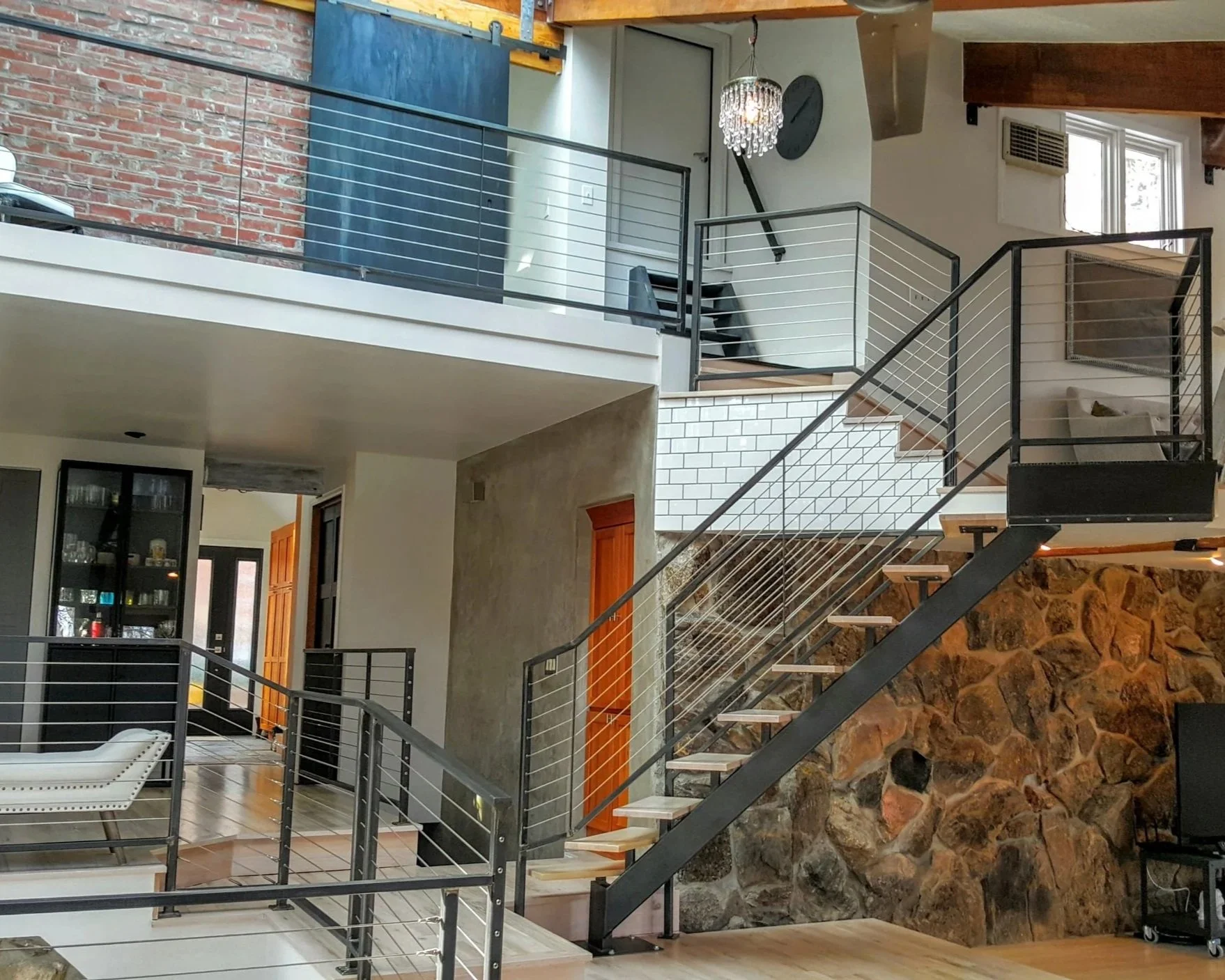 Interior cable railing fabricated and installed for a staircase