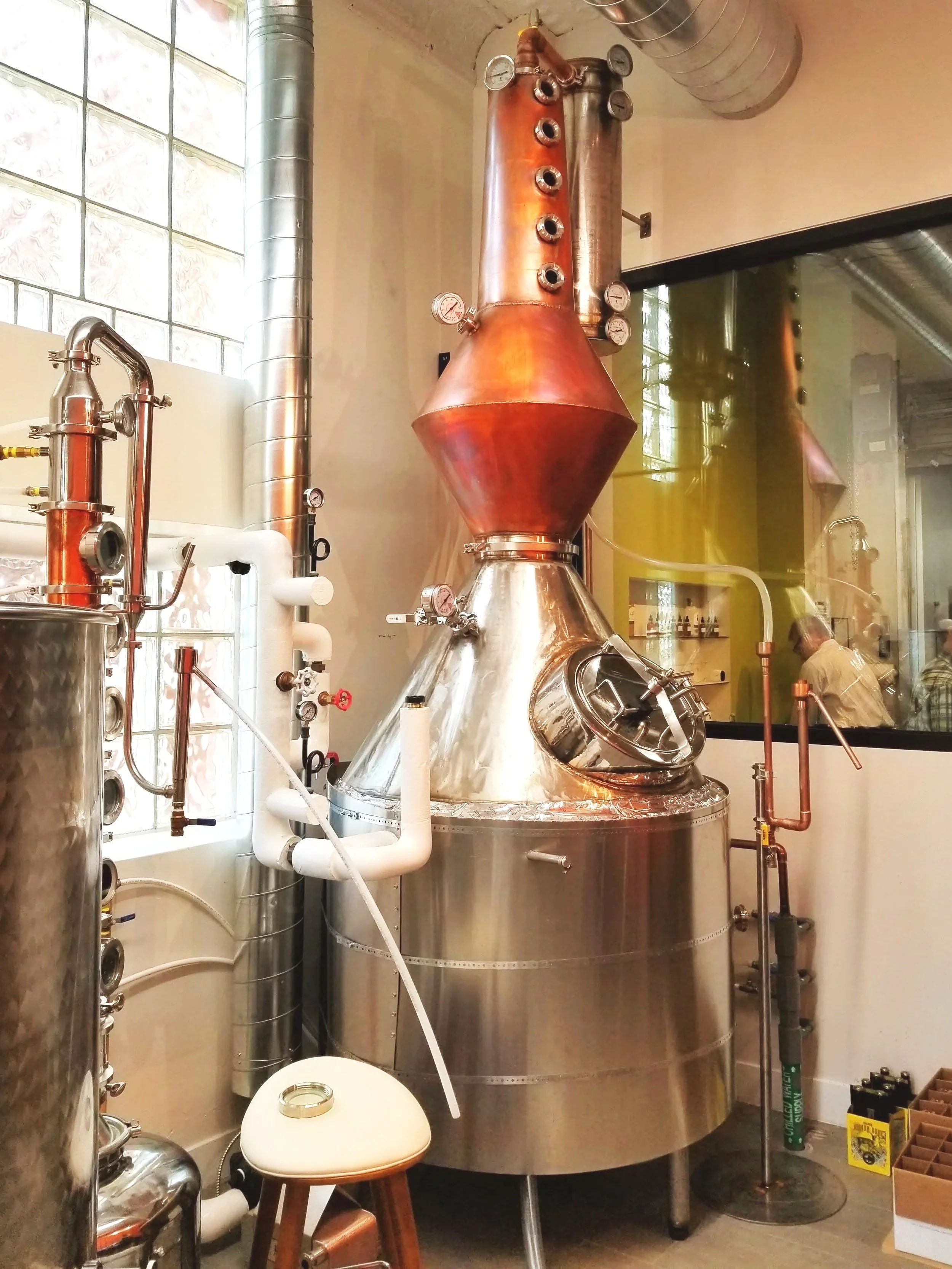 Copper and stainless steel still fabricated using specialty welding techniques