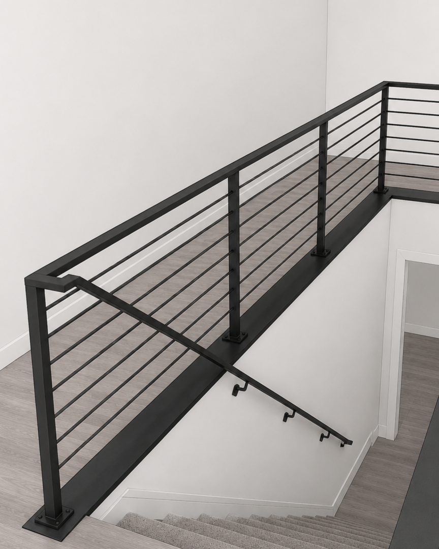3d CAD Interior view of a staircase with a black metal railing and wooden steps, overlooking a lower level with a white wall and a black handrail located in broomfield colorado