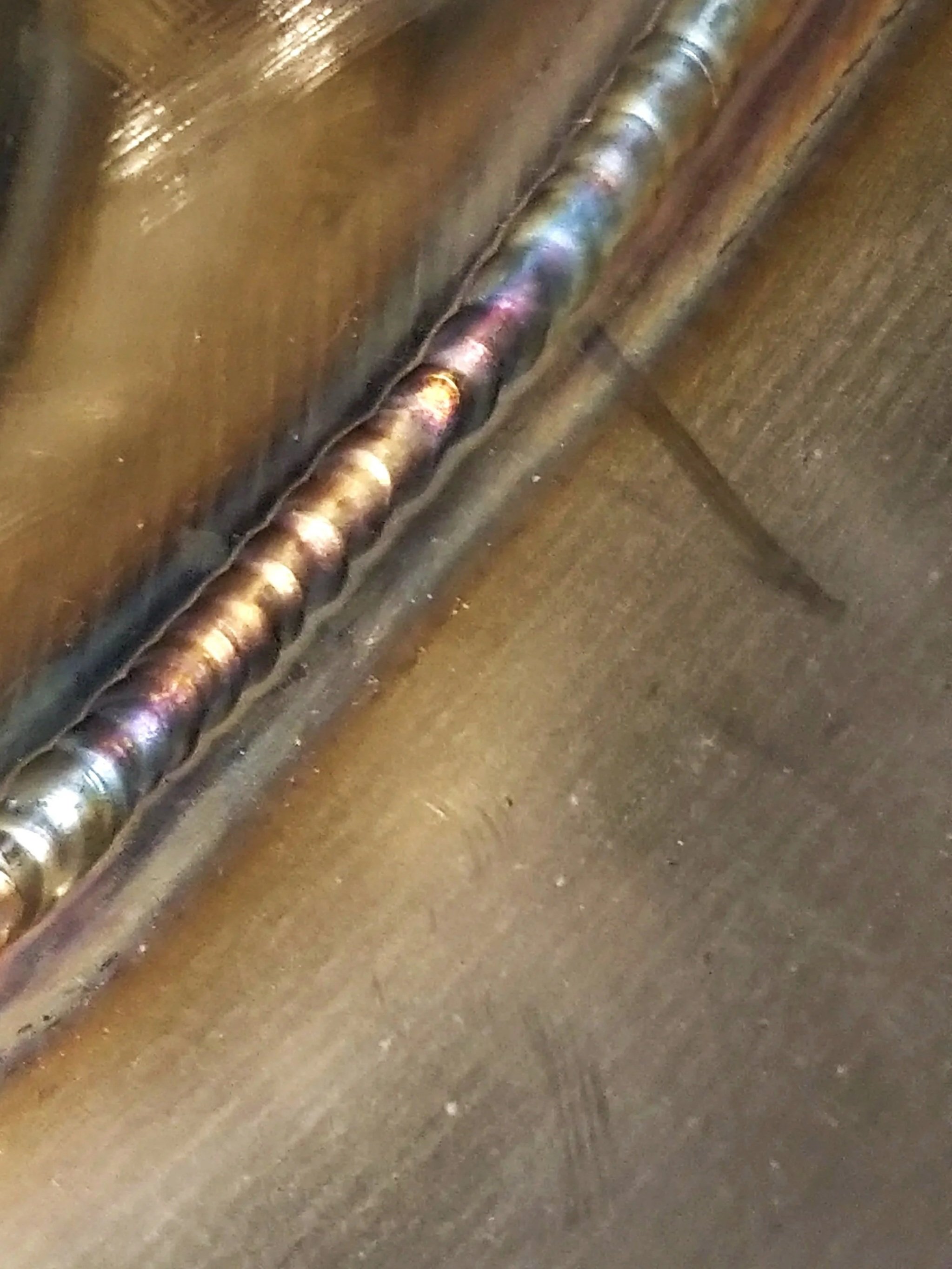 Close-up of a precision weld on specialty metal material