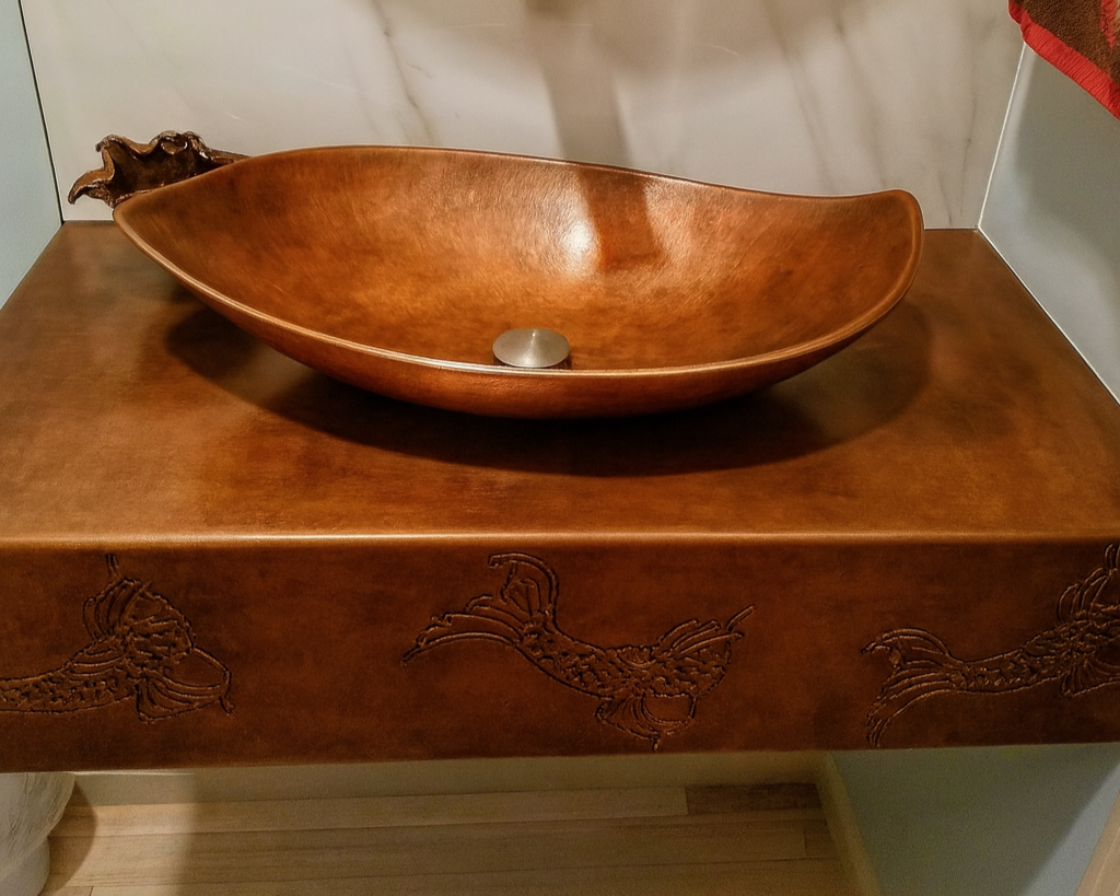 Custom copper bathroom vanity with handcrafted copper vessel sink