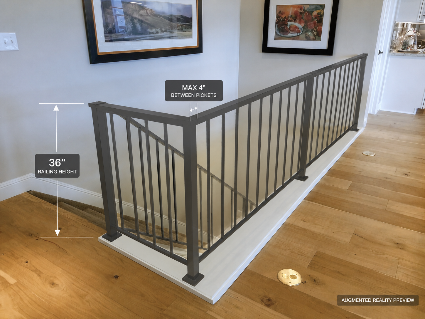 An augmented reality preview of an interior staircase with a black metal railing, 36 inches high, and a maximum of 4 inches between pickets. The staircase is next to a light-colored wall with two framed pictures hanging above.