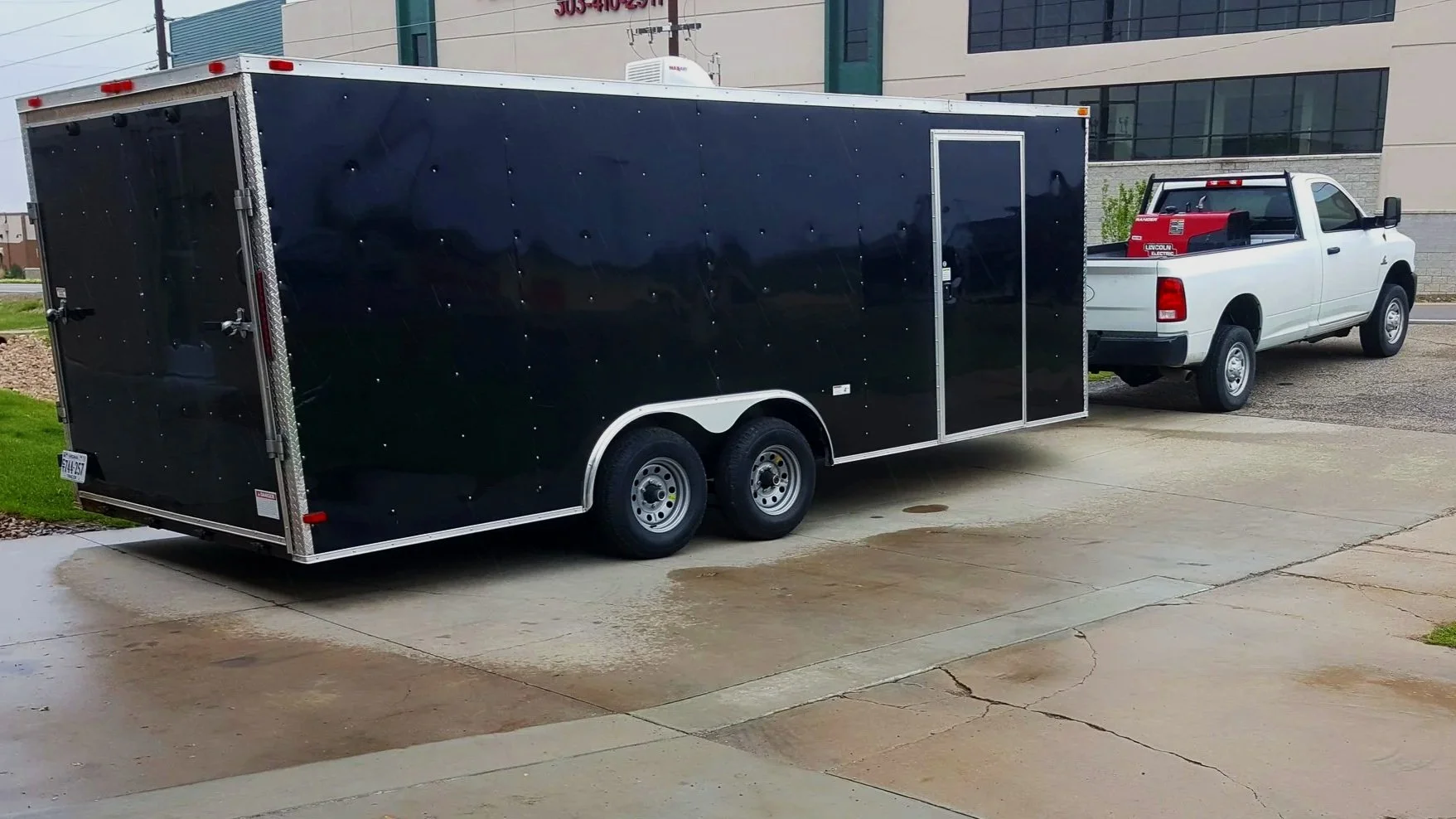 Railing contractor vehicle and trailer, loaded and ready to go