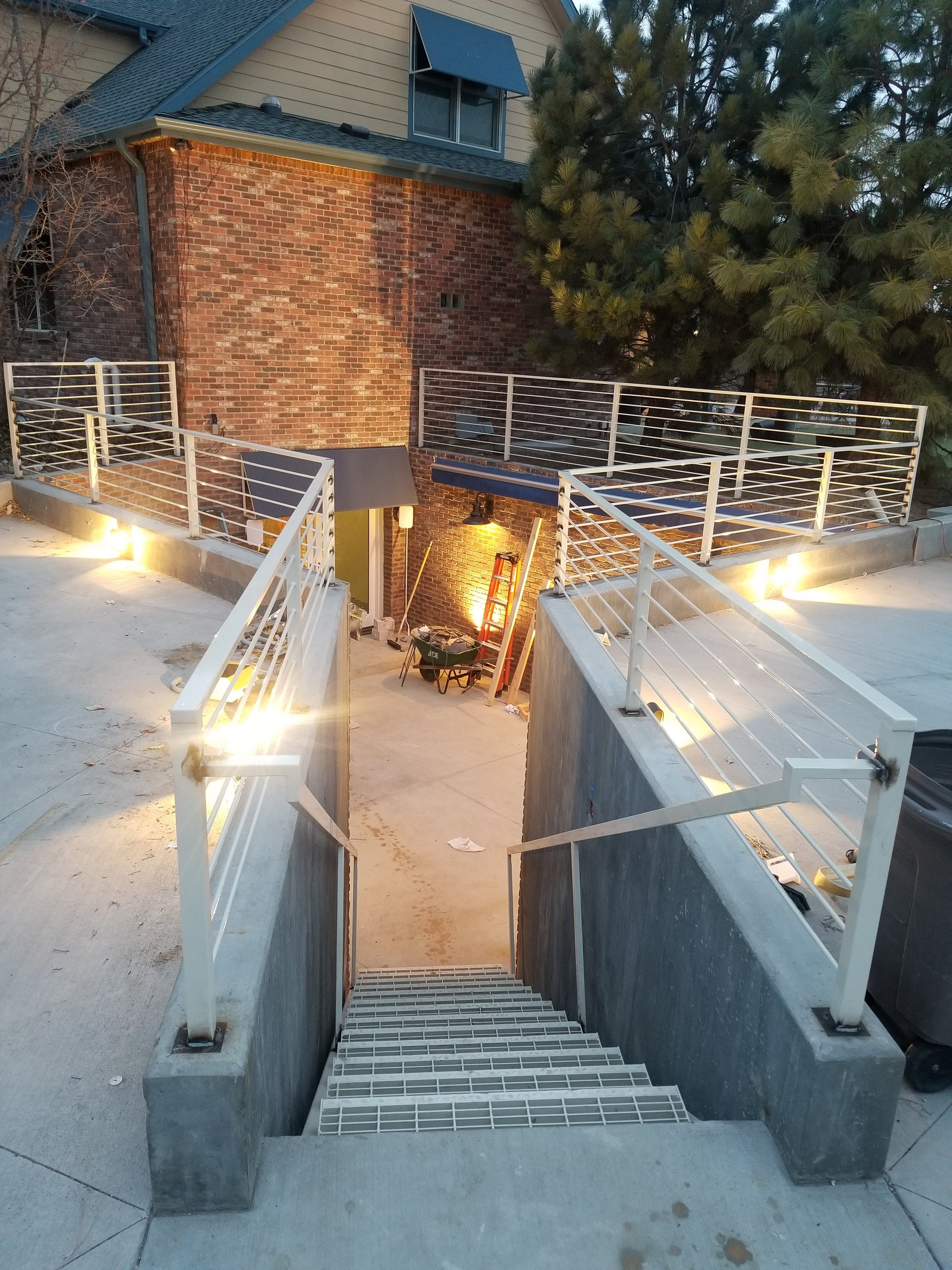 exterior commercial property iron railing painted white