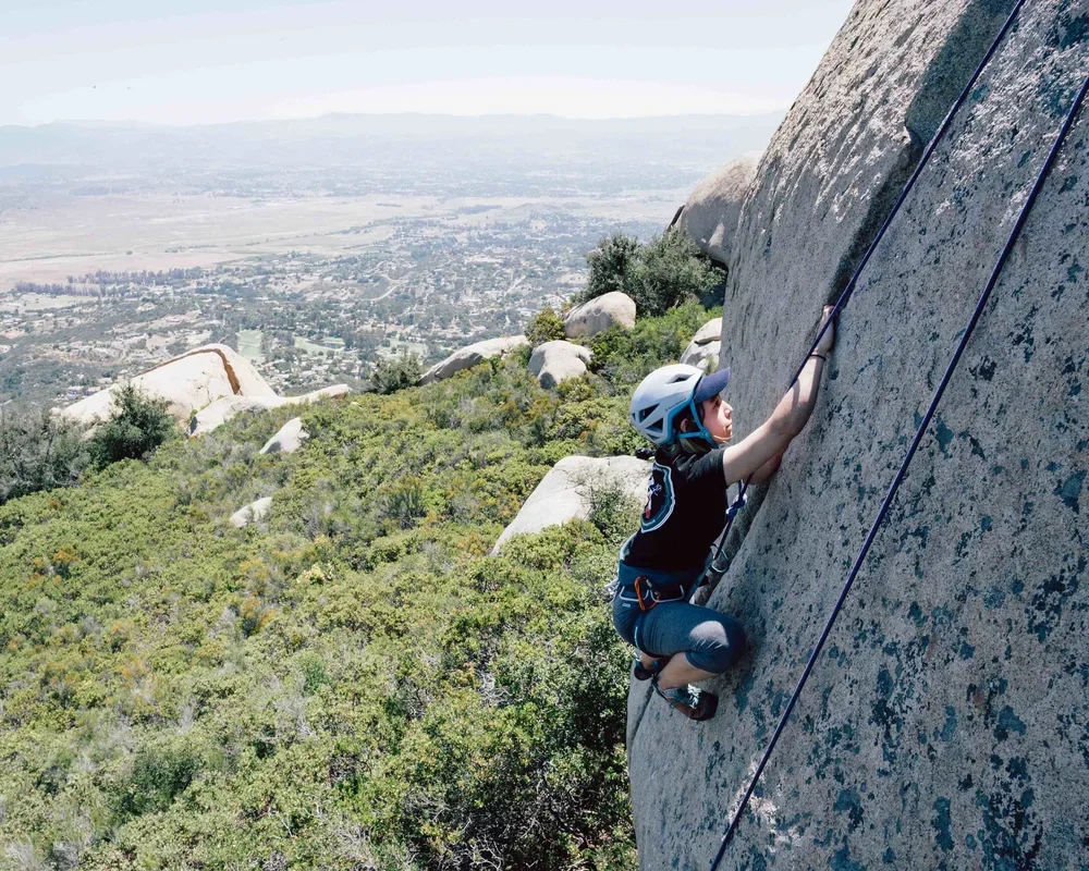 Gym to crag outdoor rock climbing class helping students transition from indoor to outdoor climbing