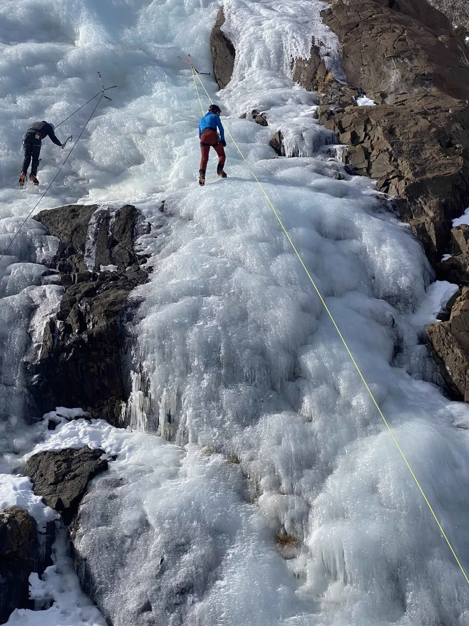 Guided ice climbing instruction for first-time climbers