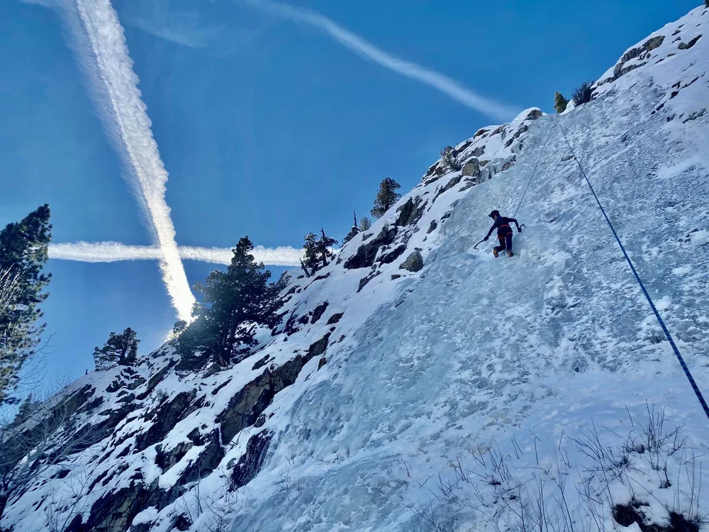 Beginner ice climbing instruction on frozen waterfalls in the Eastern Sierra