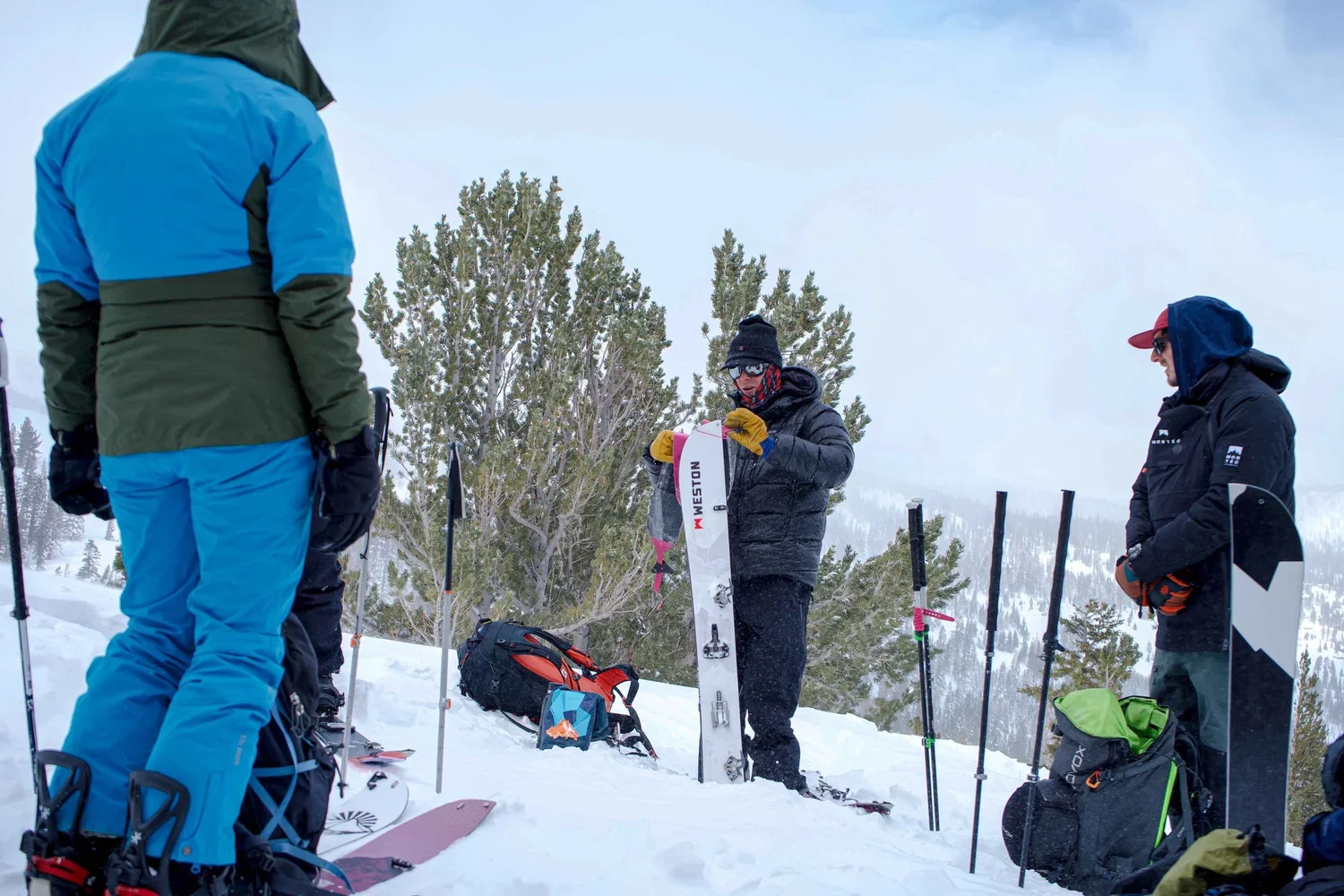 Certified guides teaching splitboard skills in the Eastern Sierra