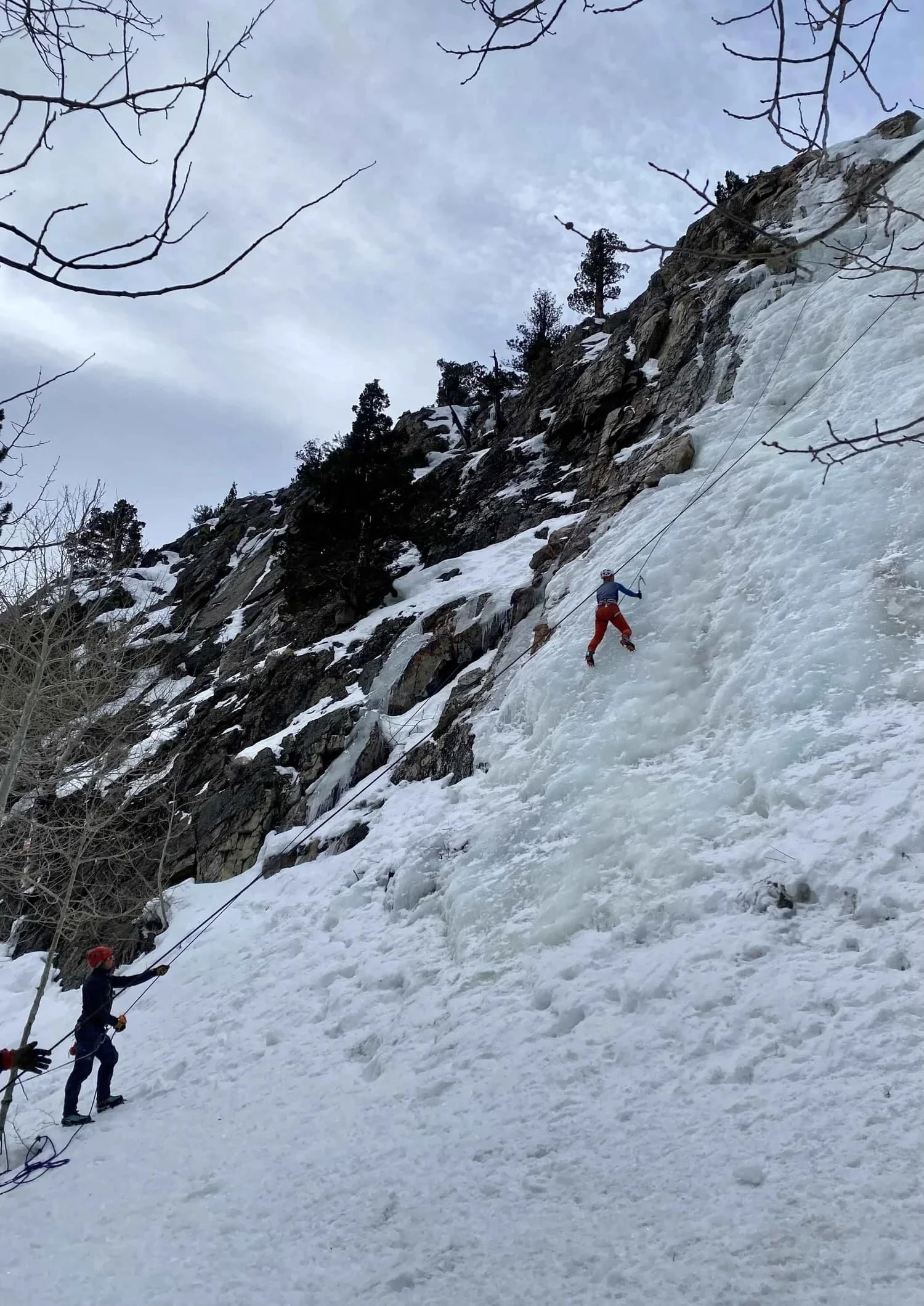 Guided ice climbing lesson on natural frozen waterfalls