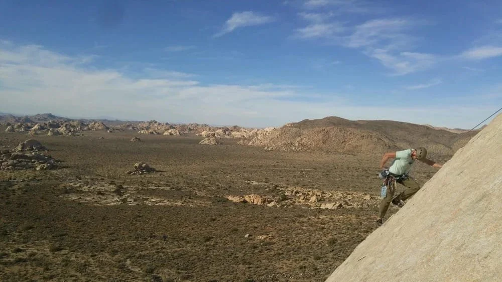 Intro to multi-pitch climbing systems and rope work in a real rock environment