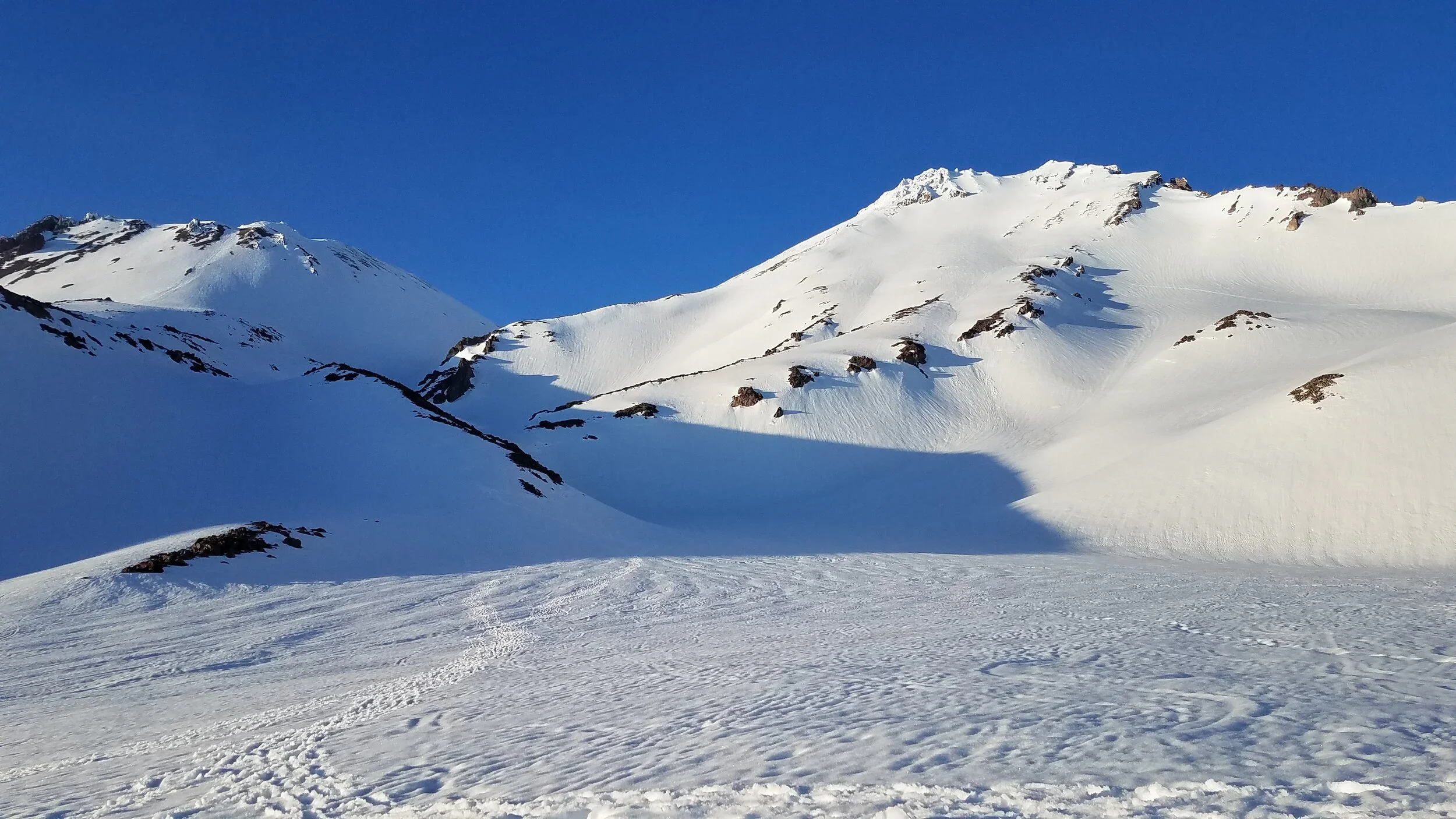 Winter backcountry travel on Mount Shasta with experienced mountain guides
