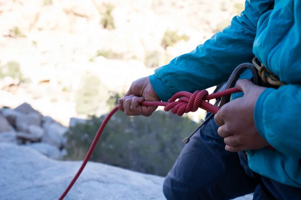 Guided climbing experience with views of the Joshua Tree desert landscape