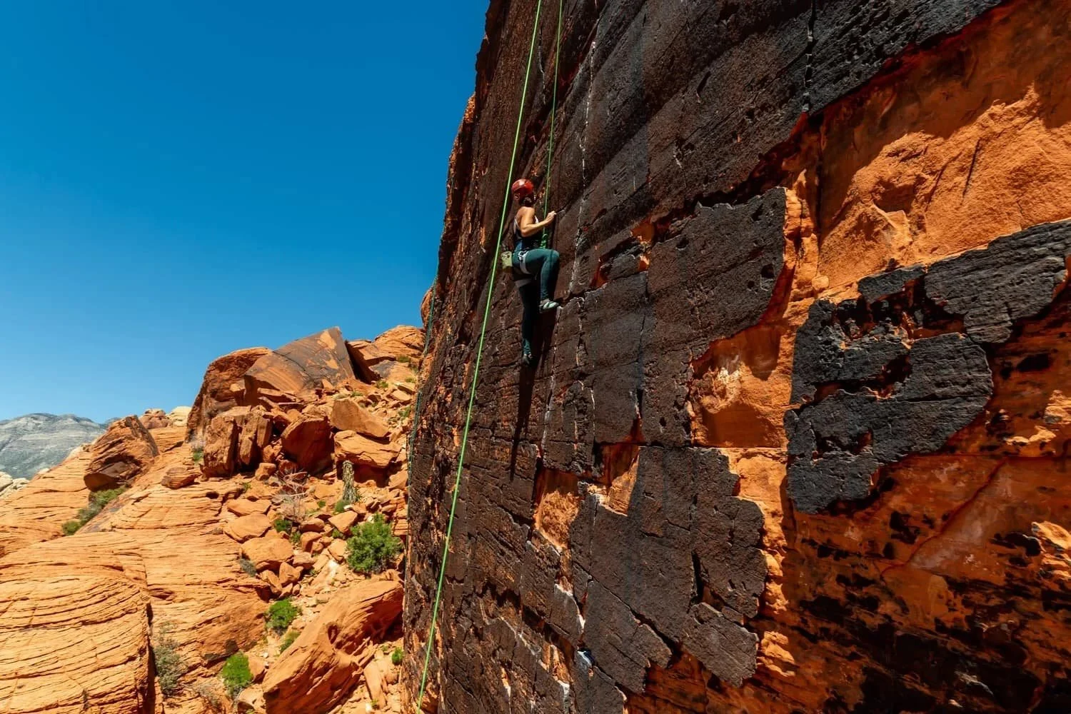 Professional mountain guides leading climbers in Red Rock Canyon