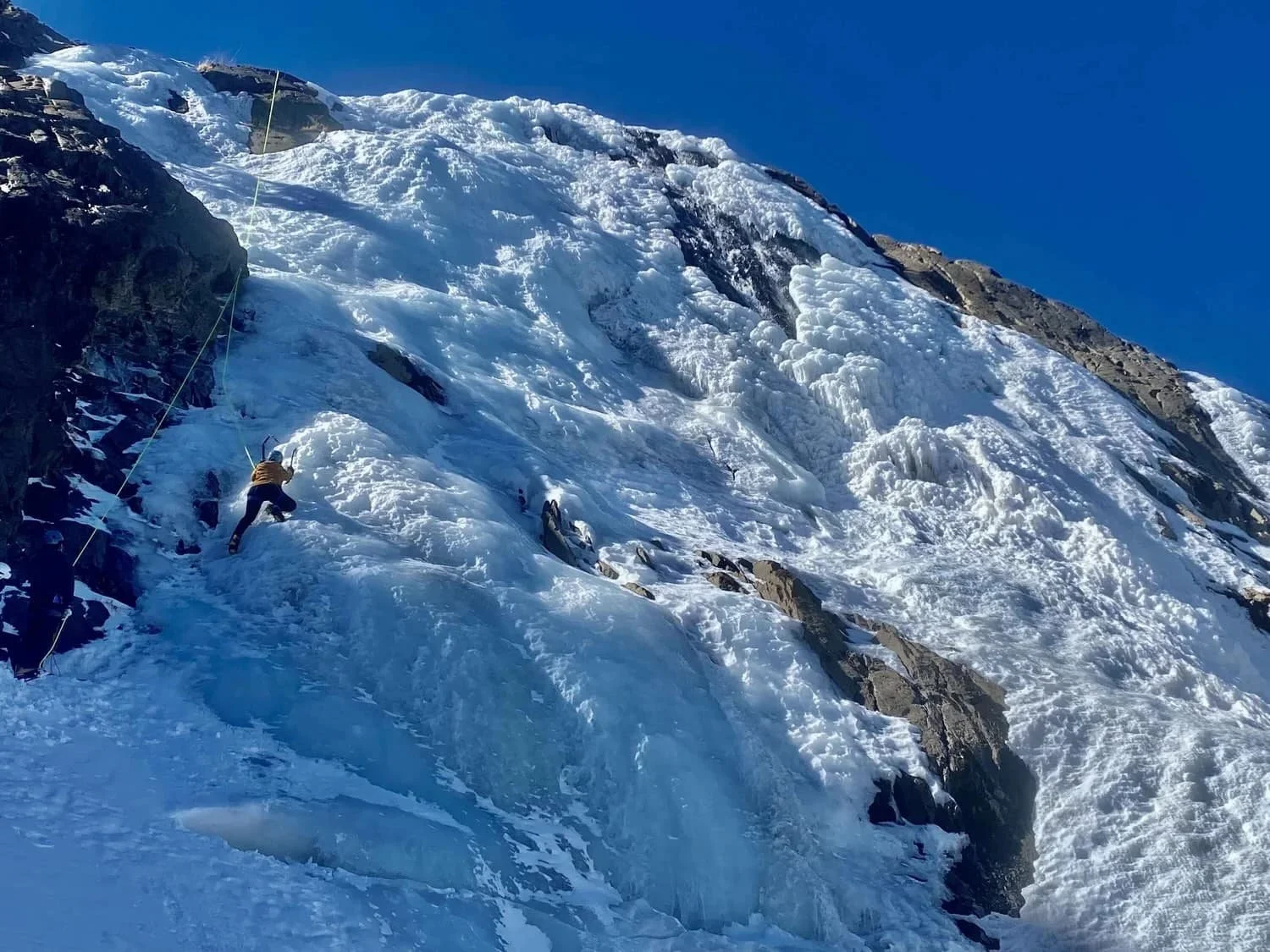 Introductory ice climbing training in a scenic alpine environment