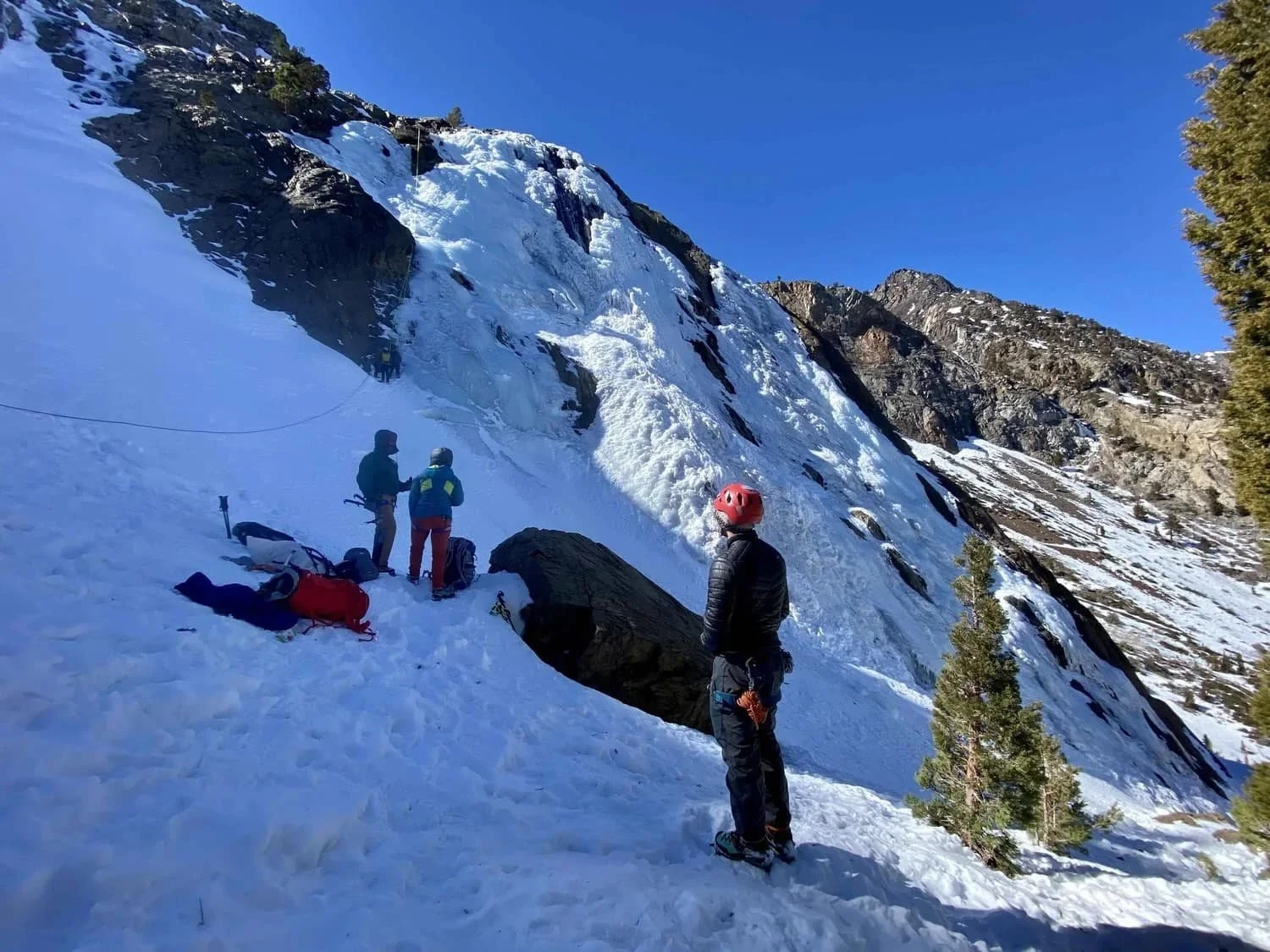 Guided beginner ice climbing experience on frozen terrain