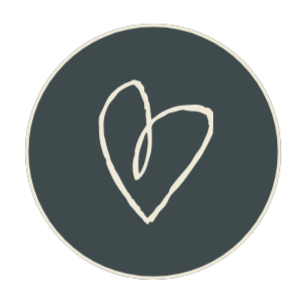 A simple white line drawing of a heart inside a dark circular background.