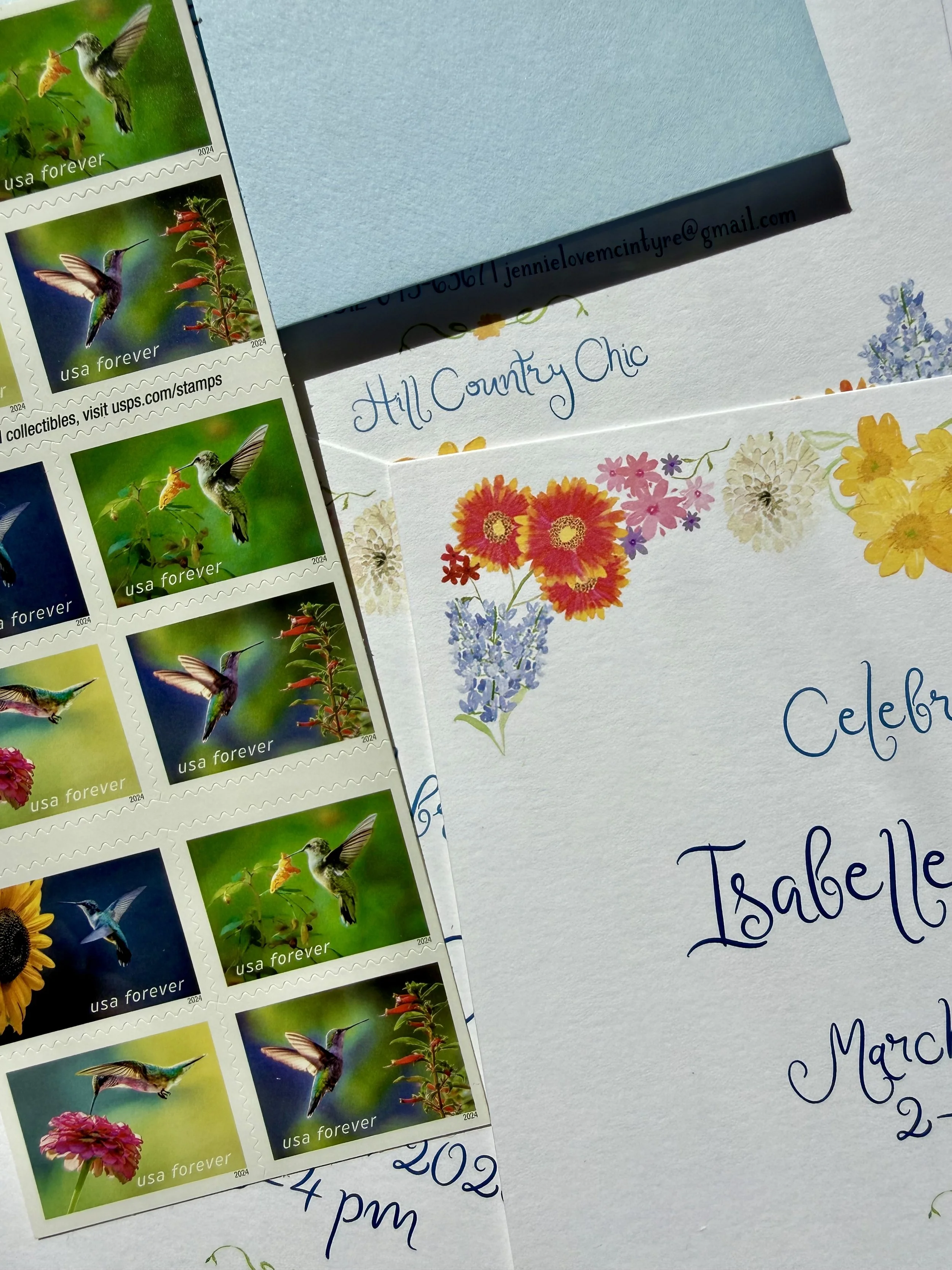 Colorful floral bridal invitation featuring hummingbird stamps