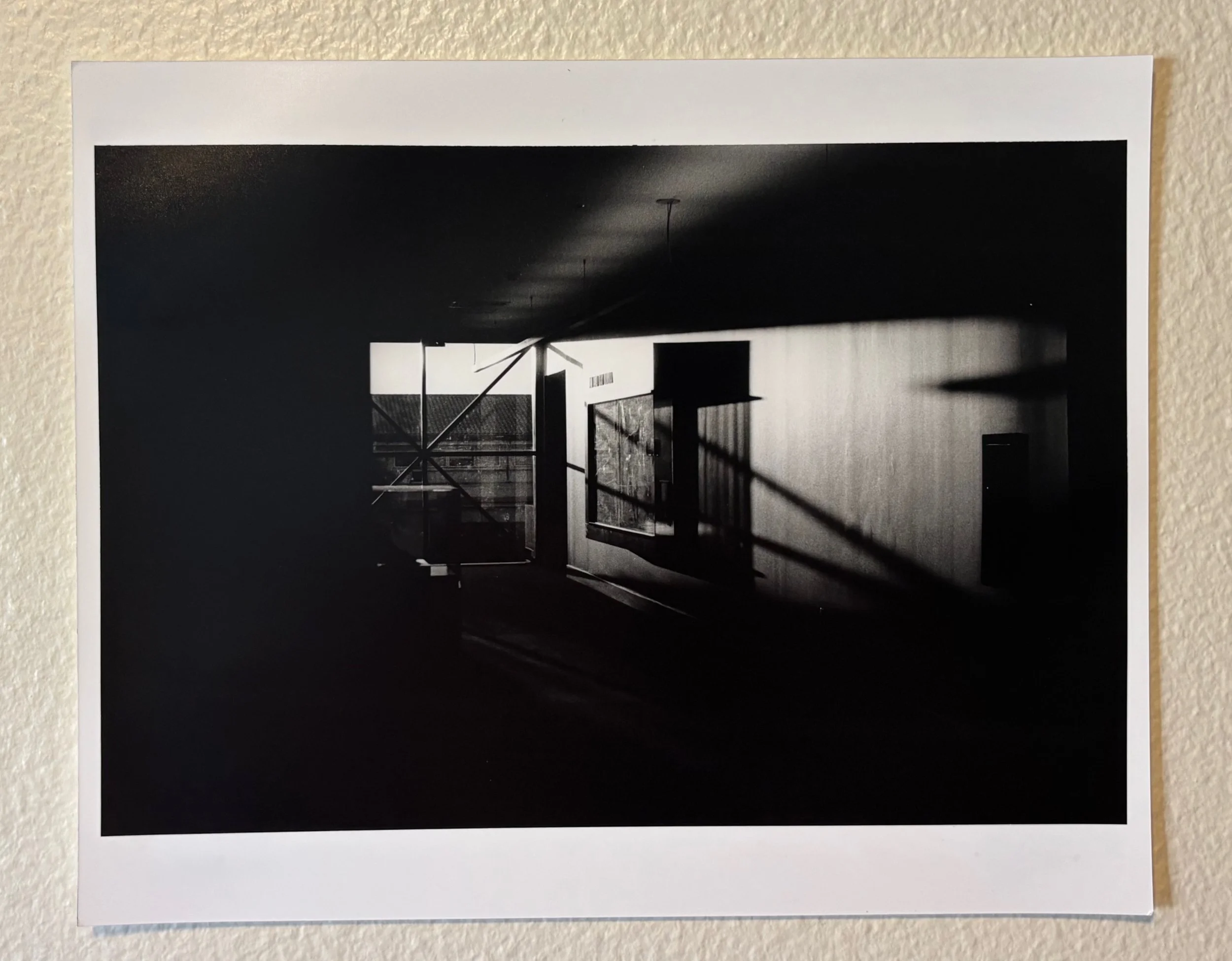 Light and Shadow Shot
2025
Analog Photography
8 x 10 in
Shot of a hallway at sunset when I was experimenting with dramatic lighting. Shot on Ilford film with an ISO of 400 and developed the photo in the darkroom. The bold lighting creates strong comp