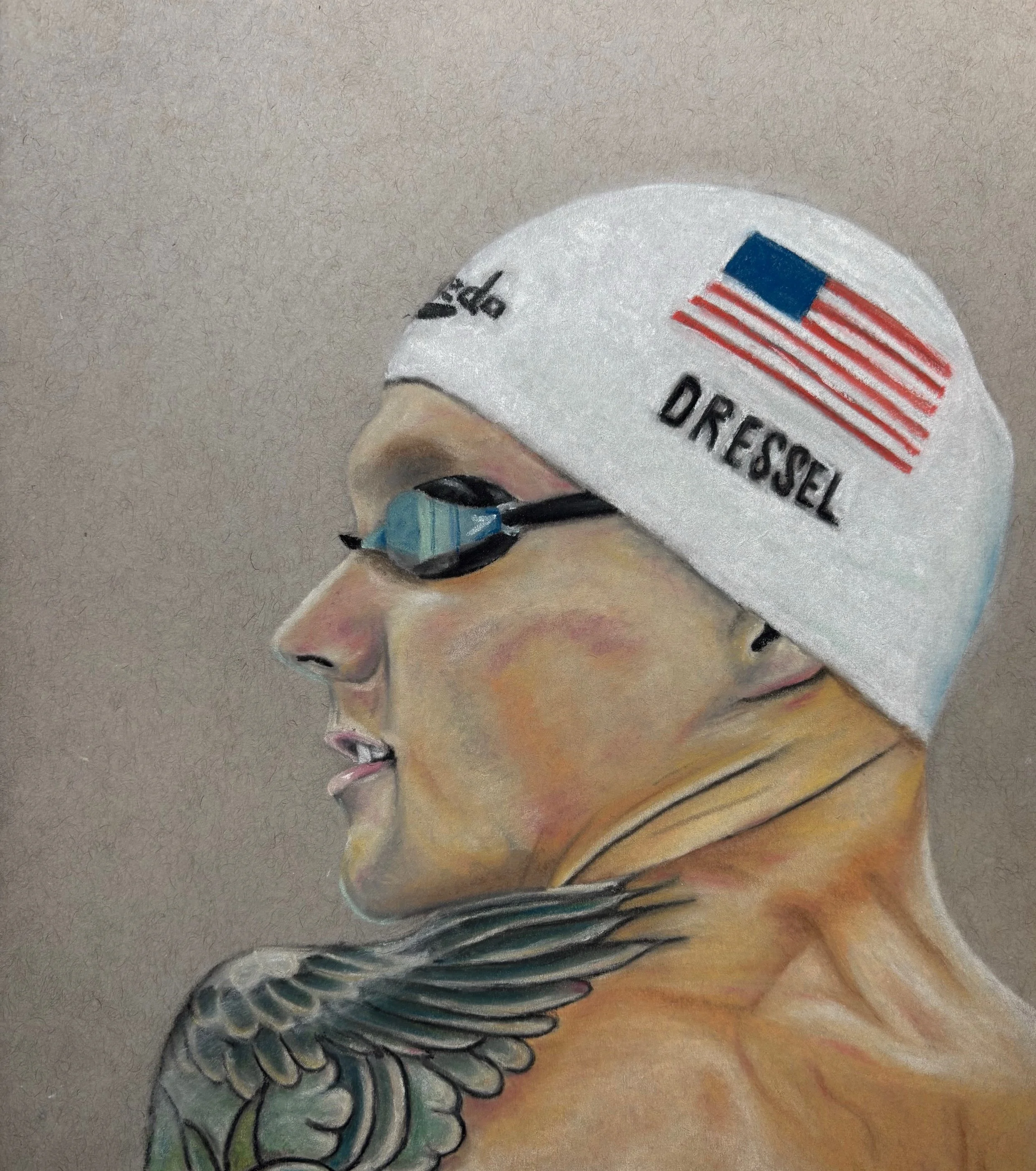 Caeleb Dressel
2025
Chalk Pastel
10.25 x 9 in
Portrait of Olympic swimmer Caeleb Dressel before his race. Part of my senior year AP art and design portfolio. I chose to use chalk pastel on gray paper because the chalk pastel really pops off the paper