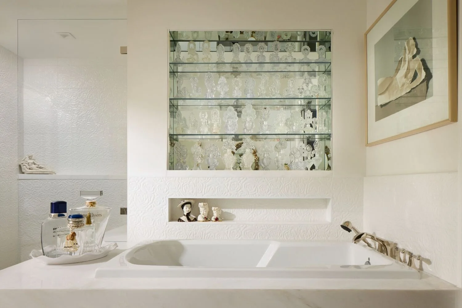 Modern bathroom with glass shower enclosure, refined tile finishes, and elevated spa-like simplicity