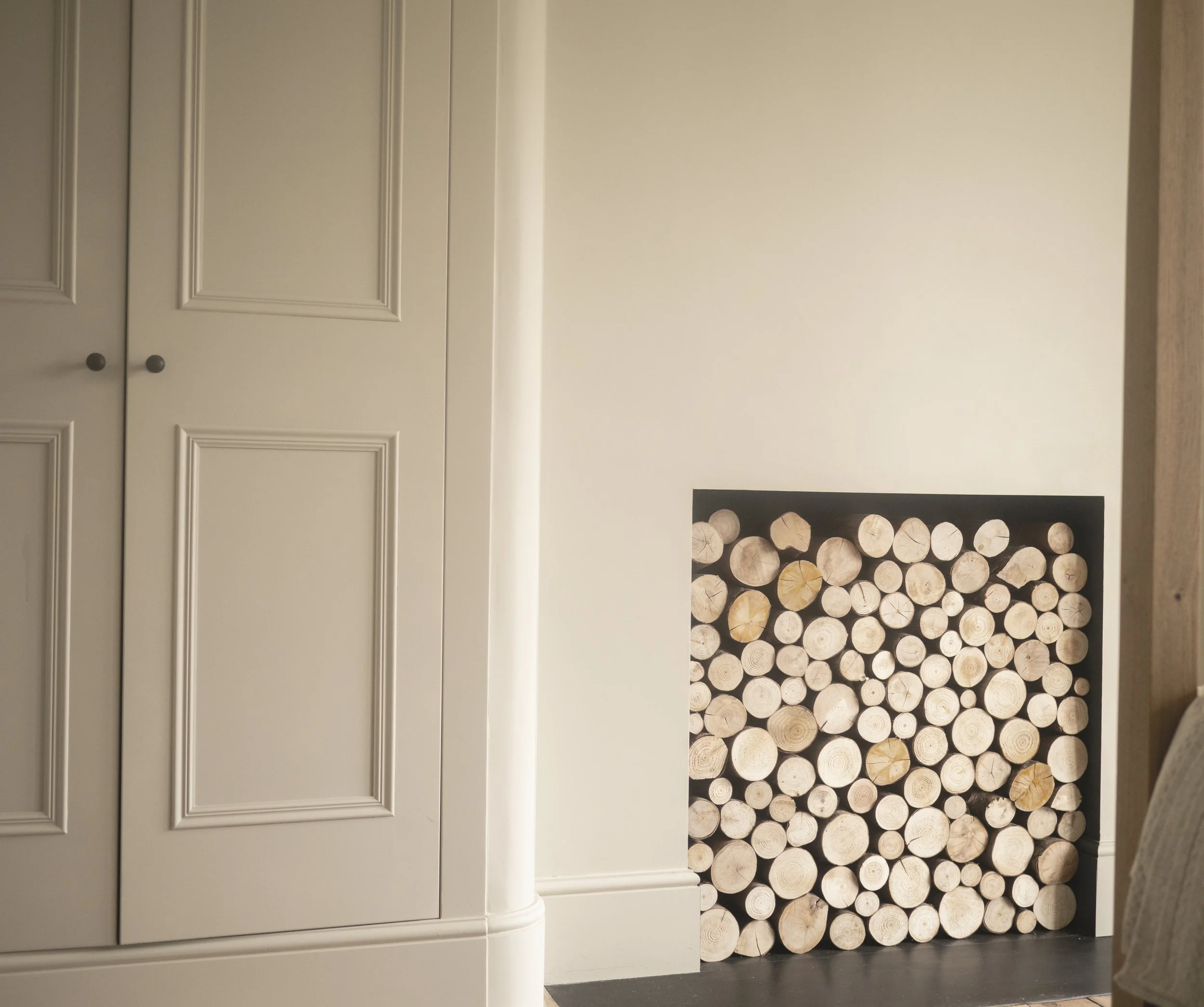 Bespoke Georgian Victorian fitted wardrobe with curved corner detail Corston Architectural brassware finished in Farrow & Ball dead flat paint