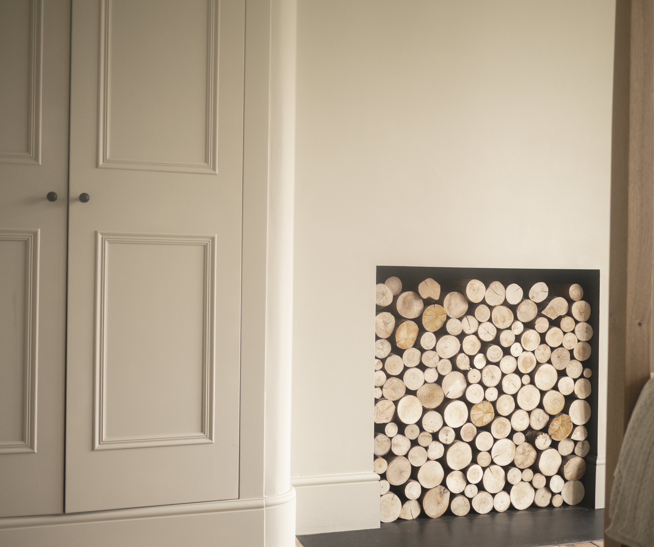 A pair Victorian Georgian bespoke fitted wardrobes with curved corner detail. Corston hardware and Farrow & Ball dead flat paint finish