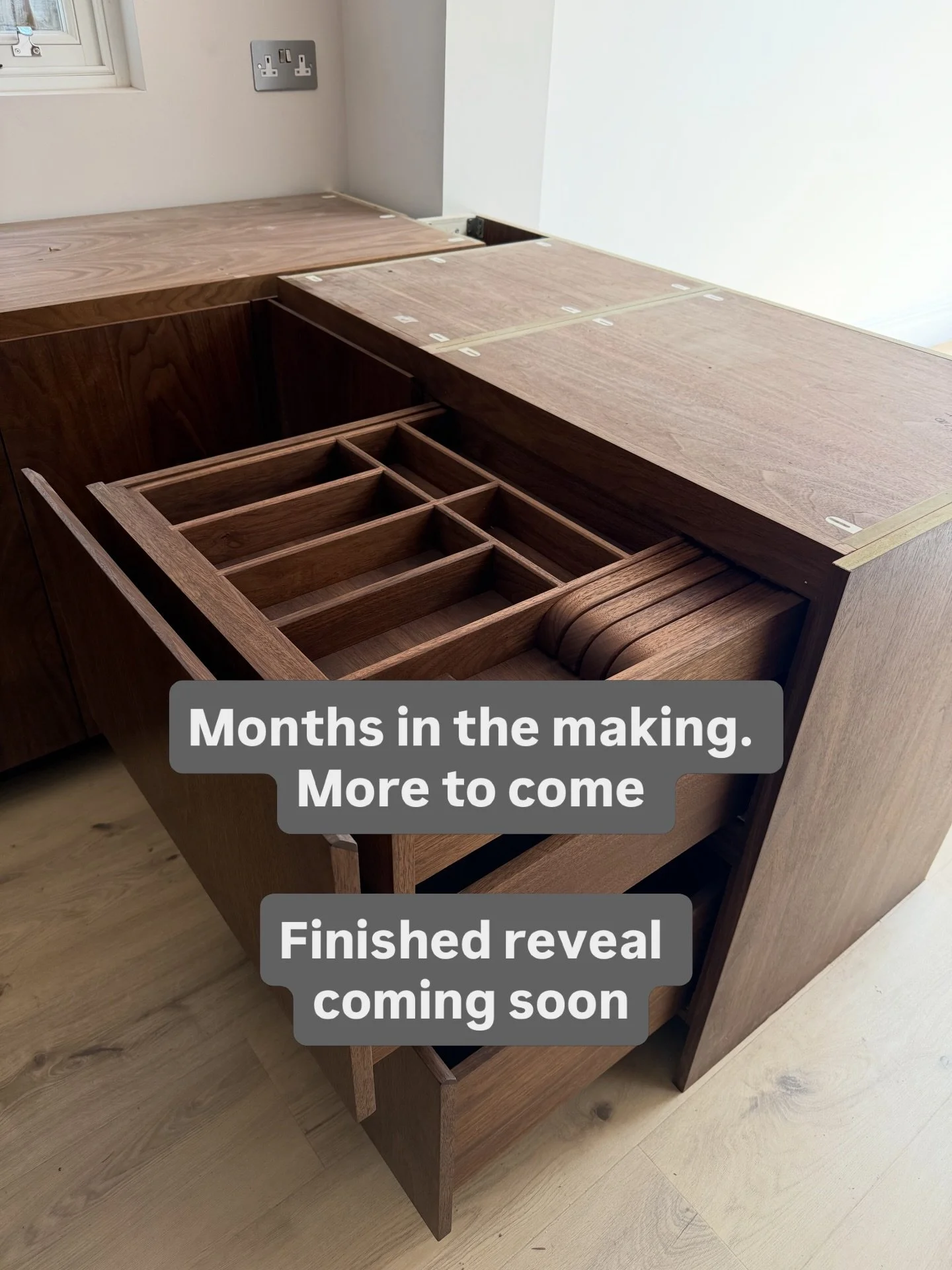 Week Two of fitting our bespoke walnut kitchen in Aldersbrook into this sleek renovation designed by @shacklewellarchitects - minimal profile doors, integrated media unit with vinyl storage, pocket door tea station. This one&rsquo;s been months in th