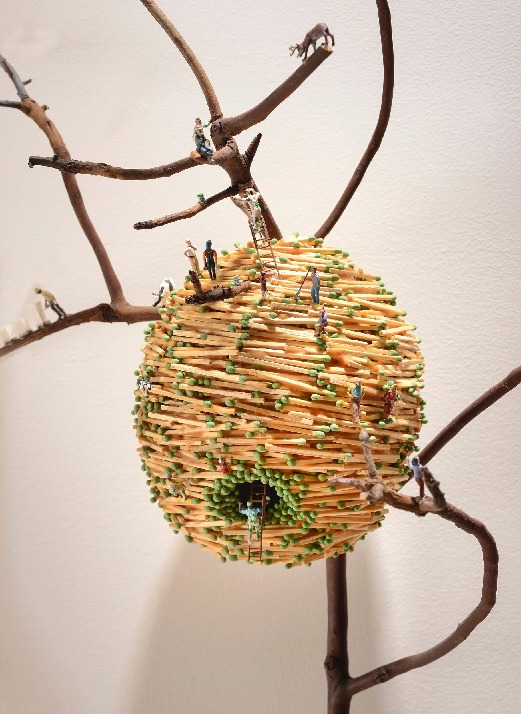 THE GREENING OF AMERICA-detail 1, wood matchsticks, madrone twig, and scale model figures, 18 h x 26 w x 8 d, 2013,  Flash Point Series  