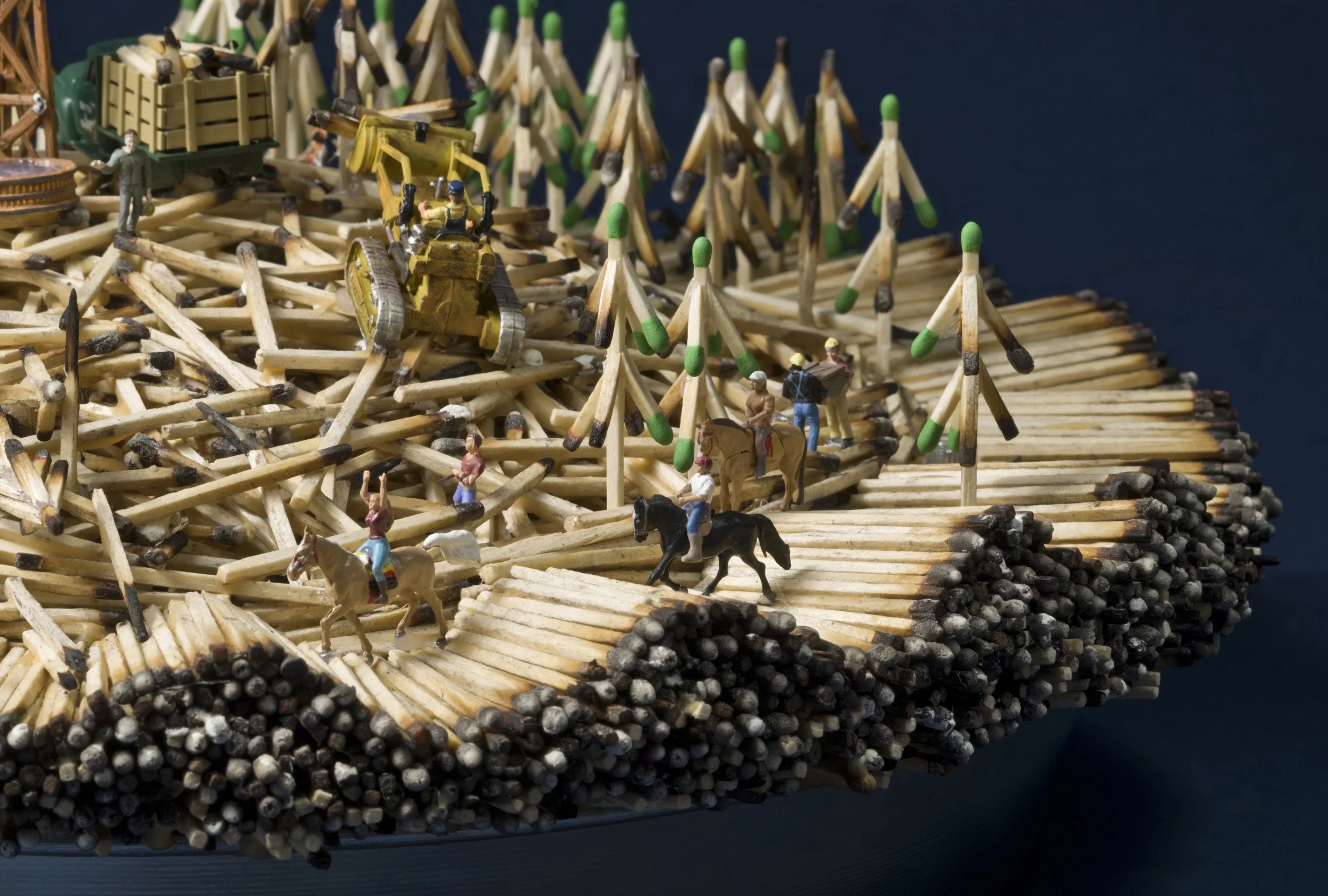 DEEP DISH ECOLOGY-detail 1, wooden matchsticks, miniature figures, aluminum pan, 6" h x 18" dia., 2013,  Flash Point Series  