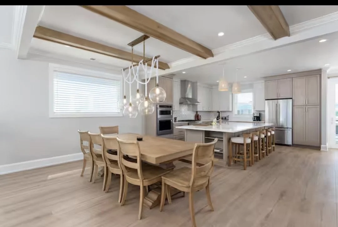 Dining room design by Foxglove and Fir Design Studio. Warm neutral Interiors soft coastal design