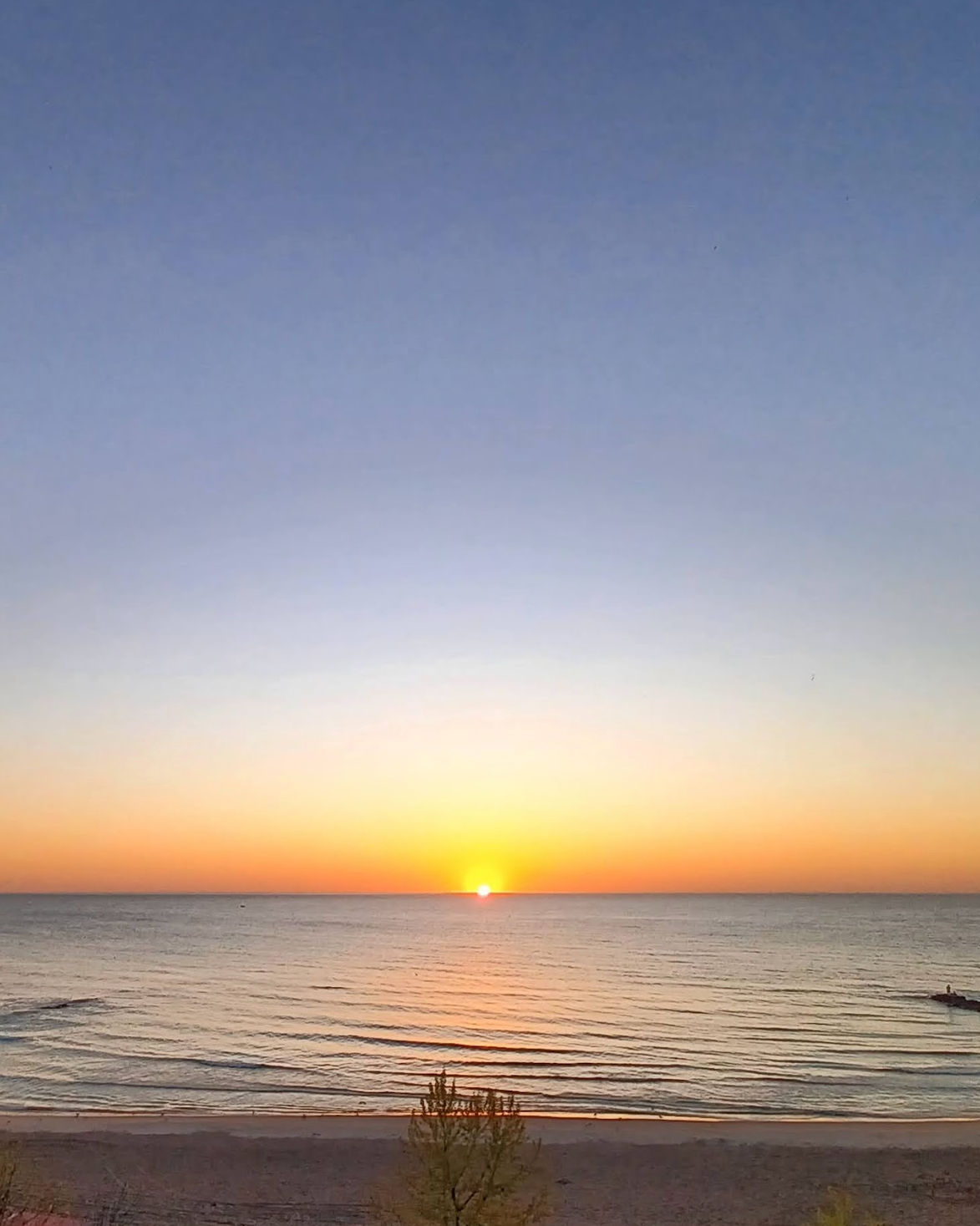 Sunrise on Lake Michigan at Atwater Beach in Milwaukee, Wisconsin.
